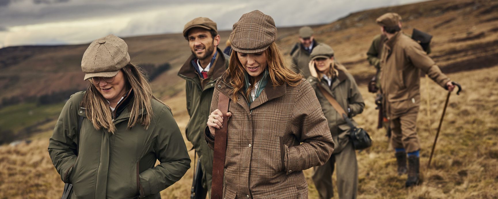 Brown tweed jacket with collar and pockets for pheasant shooting