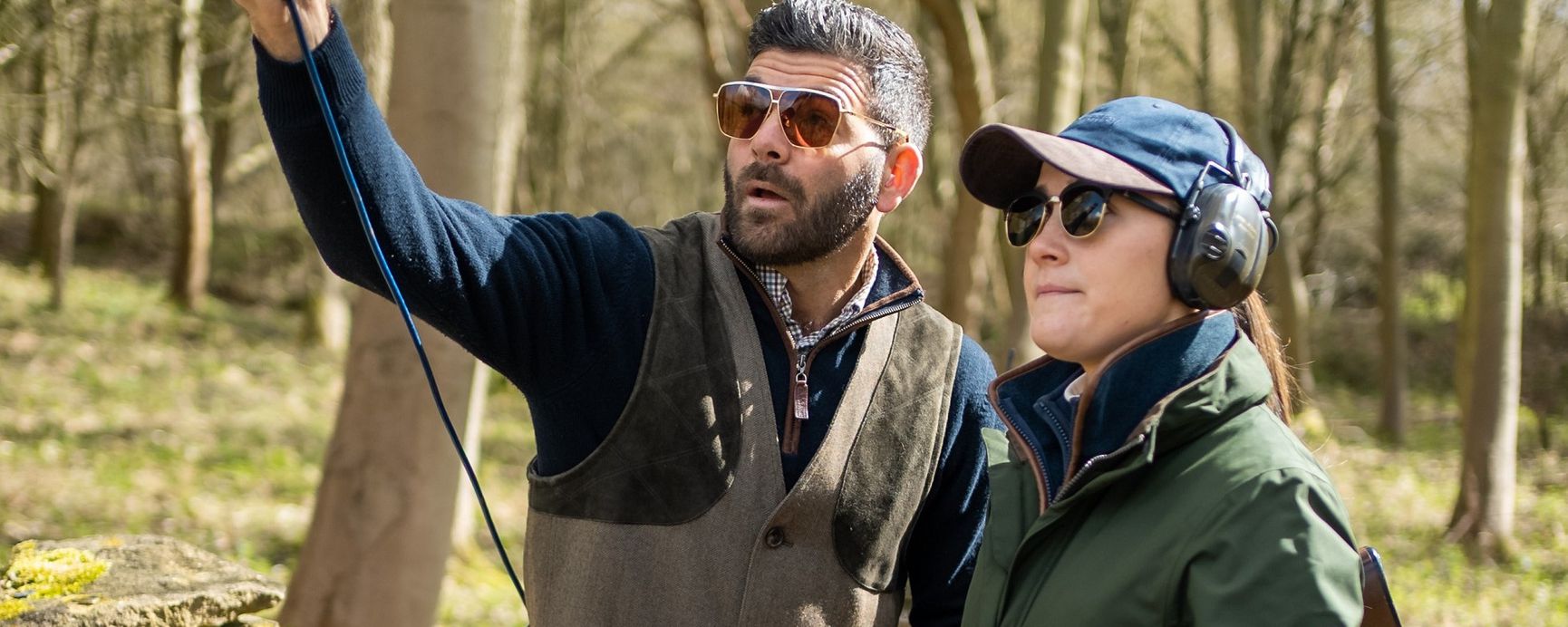 Ed Solomons in brown leather shooting vest over dark blue sweater
