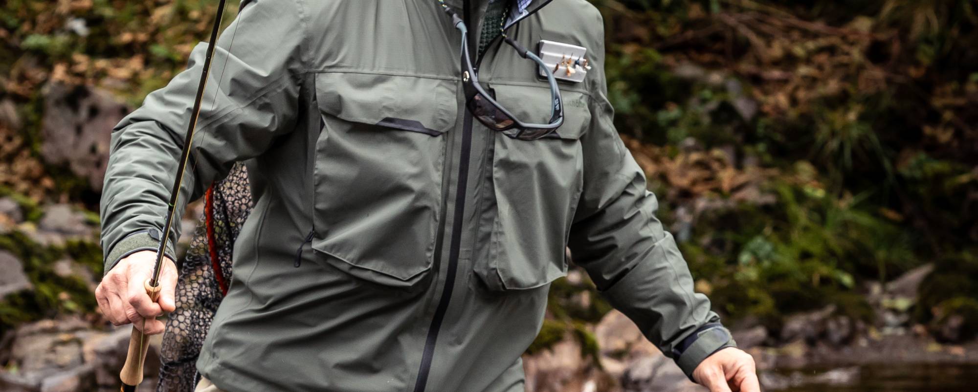 Olive green Toray Dermizax waterproof fly fishing jacket with pockets, black zipper