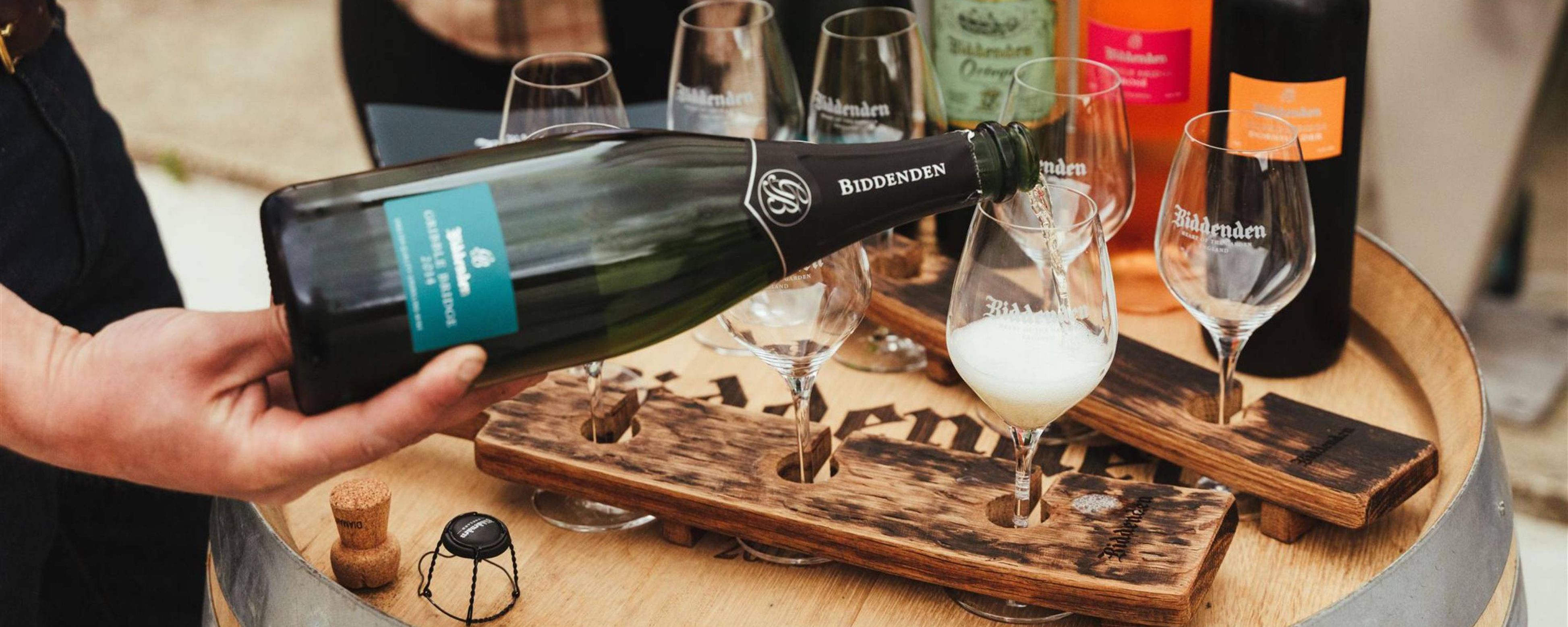Dark green Biddenden sparkling wine bottle with teal label