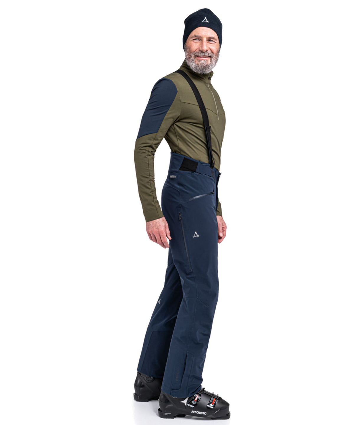 Men’s Trevalli navy blazer ski pants with black suspenders and subtle white logo on the thigh