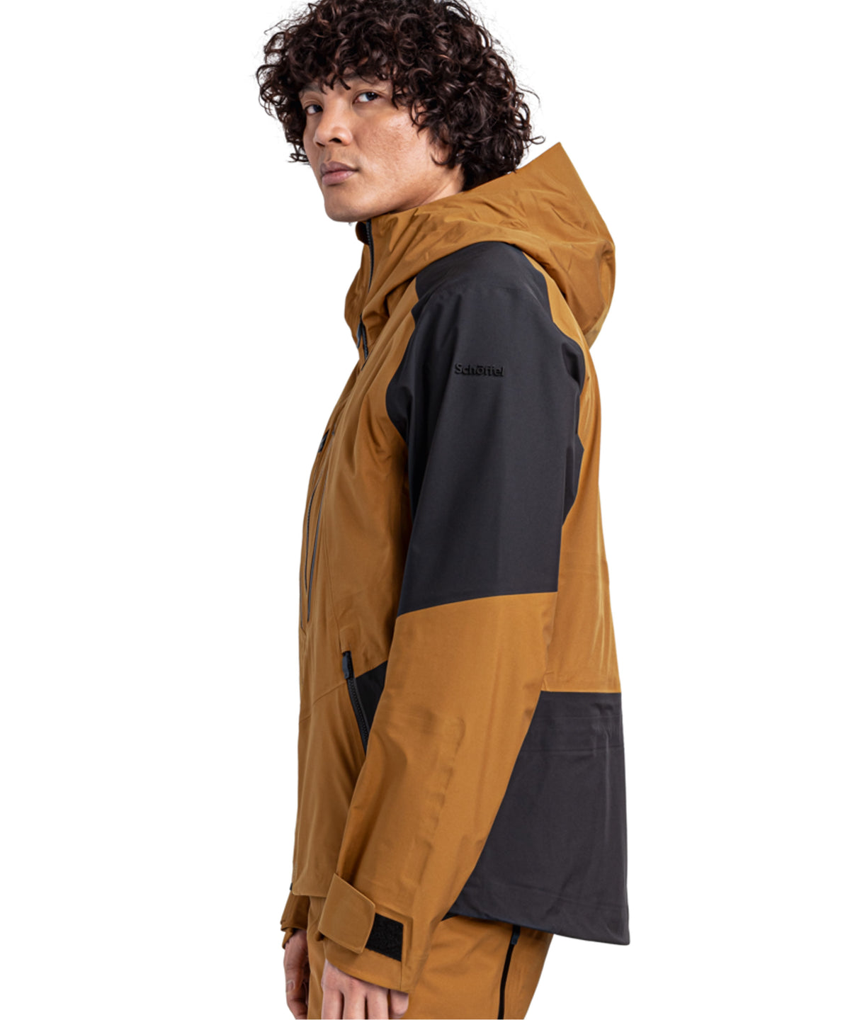 Men’s lufeld shell jacket caramel is a tan and black color-blocked waterproof jacket with hood