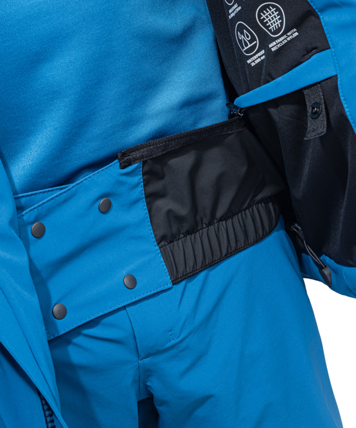 Men’s skuta jacket allporta bright blue ski suit with black accents and snap buttons for winter