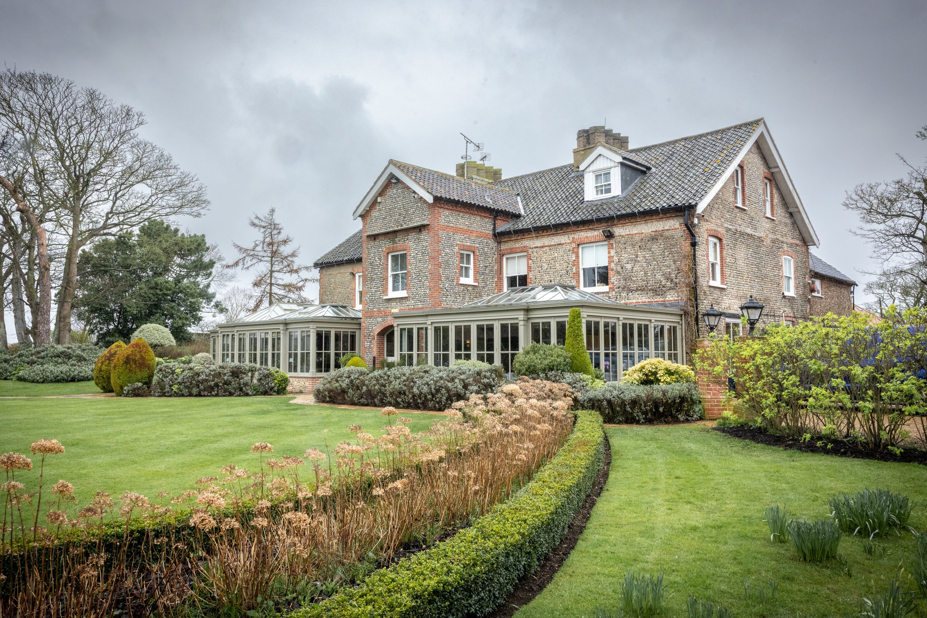 Image of Morston Hall in North Norfolk with beautifully kept gardens.