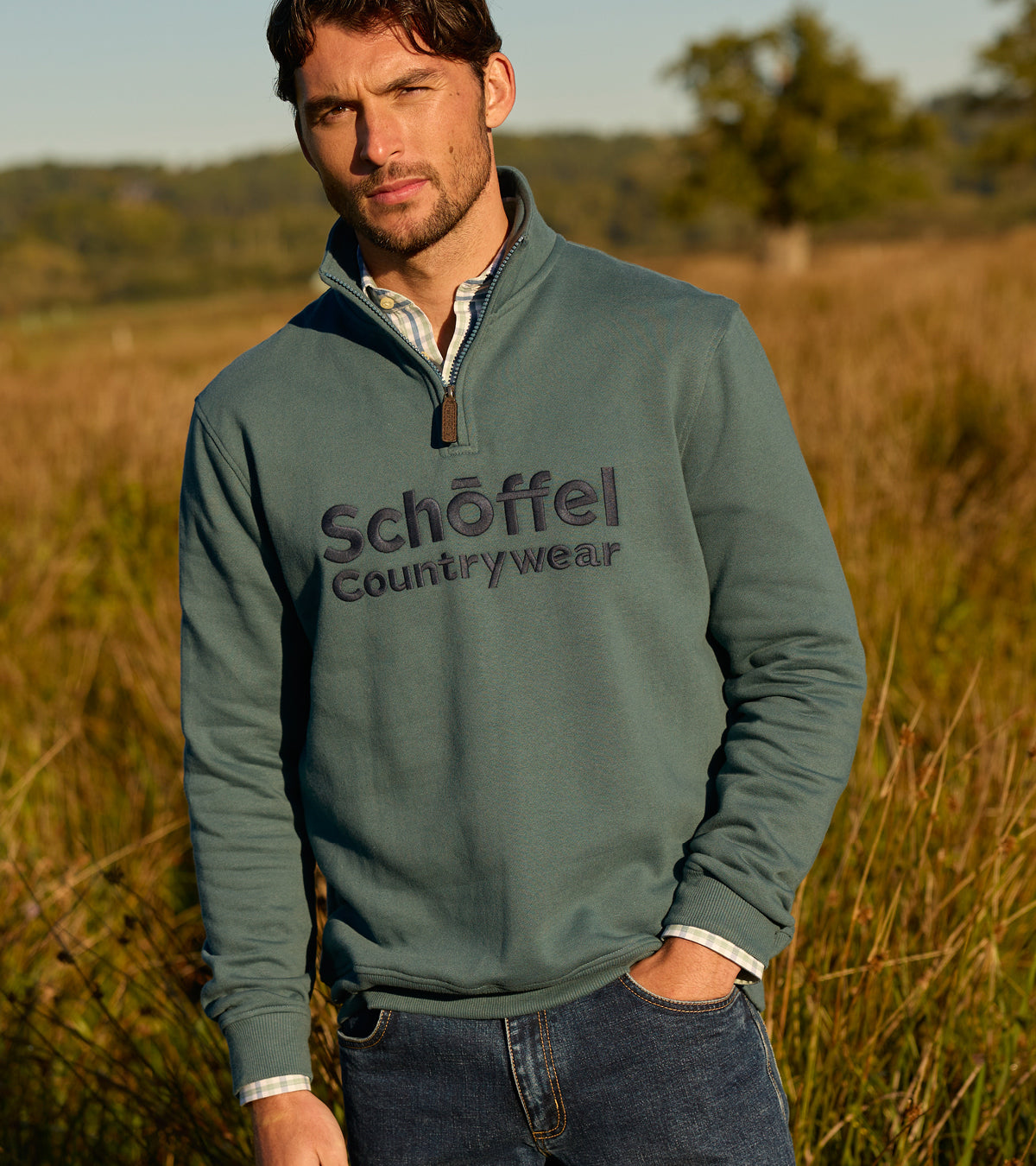 Man wearing a Schöffel Countrywear sweatshirt in a field