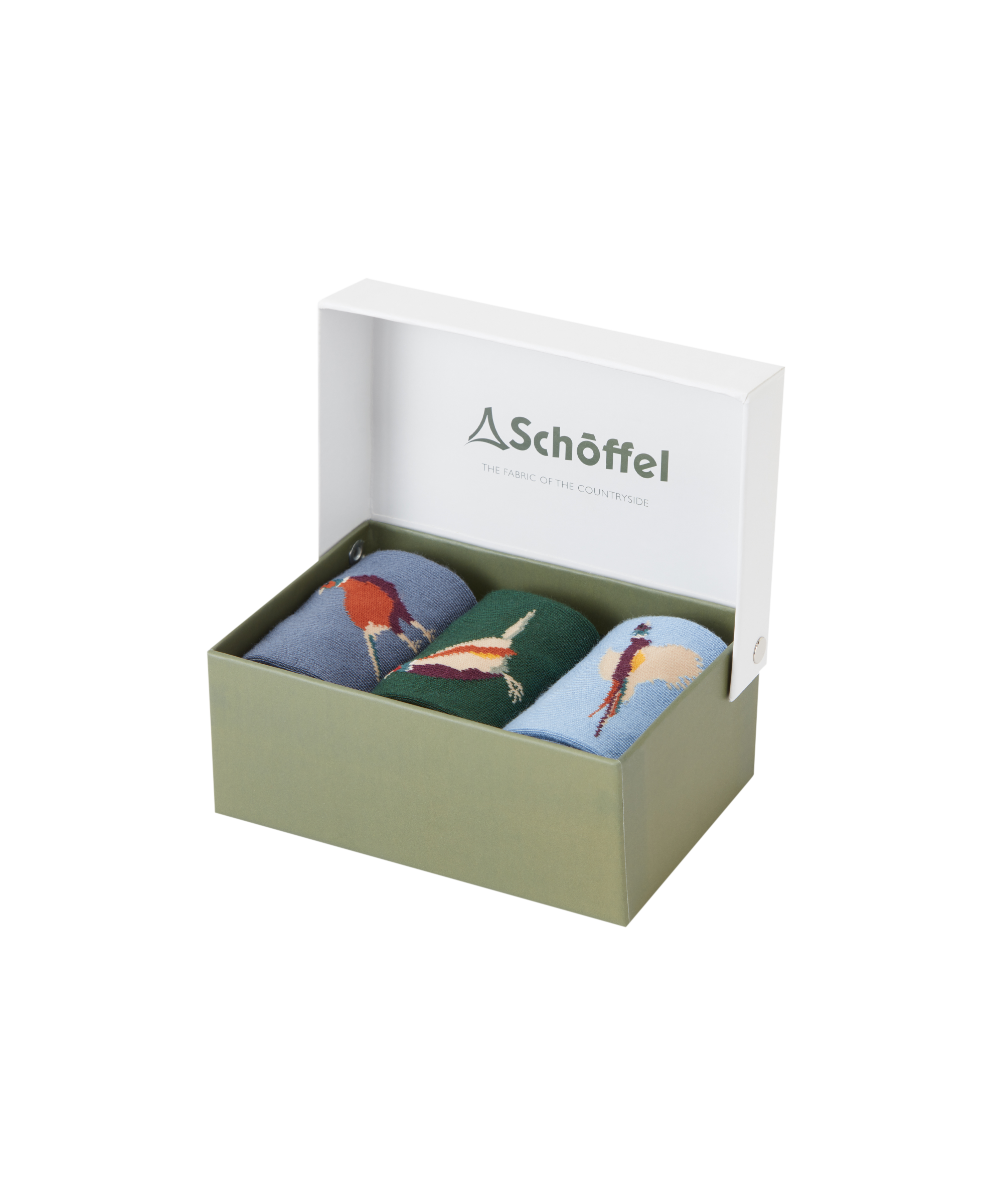 Set of three socks with designs in a Schöffel box on a white background