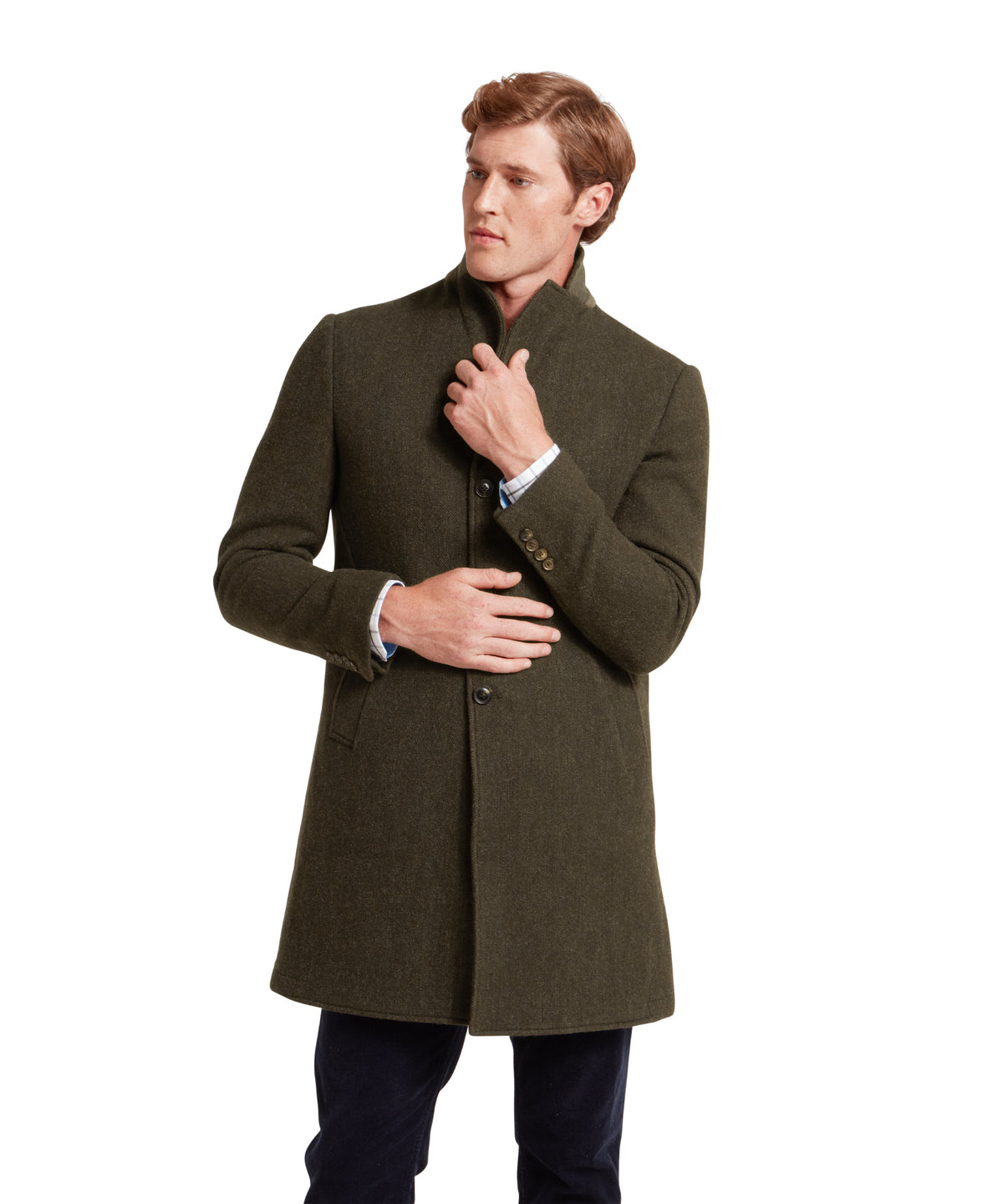 Schöffel's Banchory Tweed Jacket in Green, on model, buttoned front in dark olive herringbone tweed