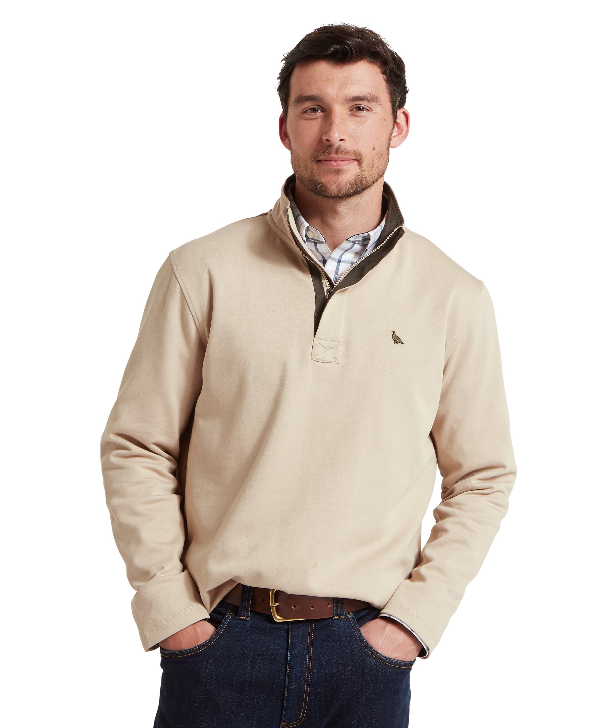 Man wearing a beige sweatshirt with a collar, standing against a white background