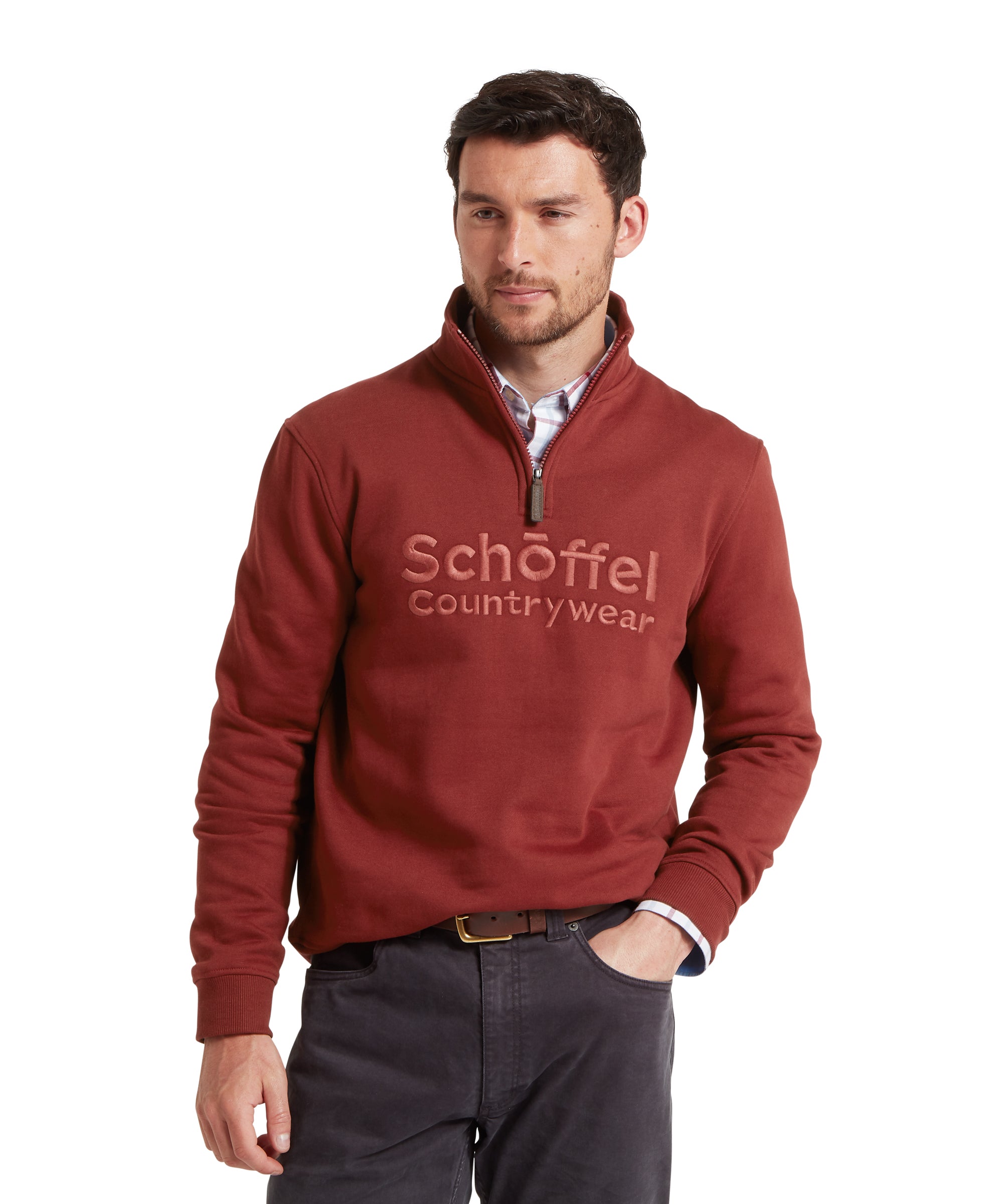Man wearing a red Schöffel countrywear sweater on a white background