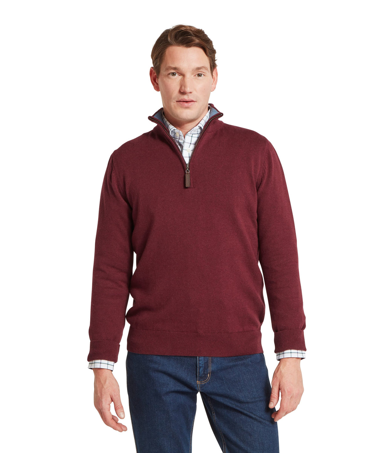 Model wearing the Schöffel Calton Cotton Cashmere 1/4 Zip Jumper in Red, subtle plaid collar lining