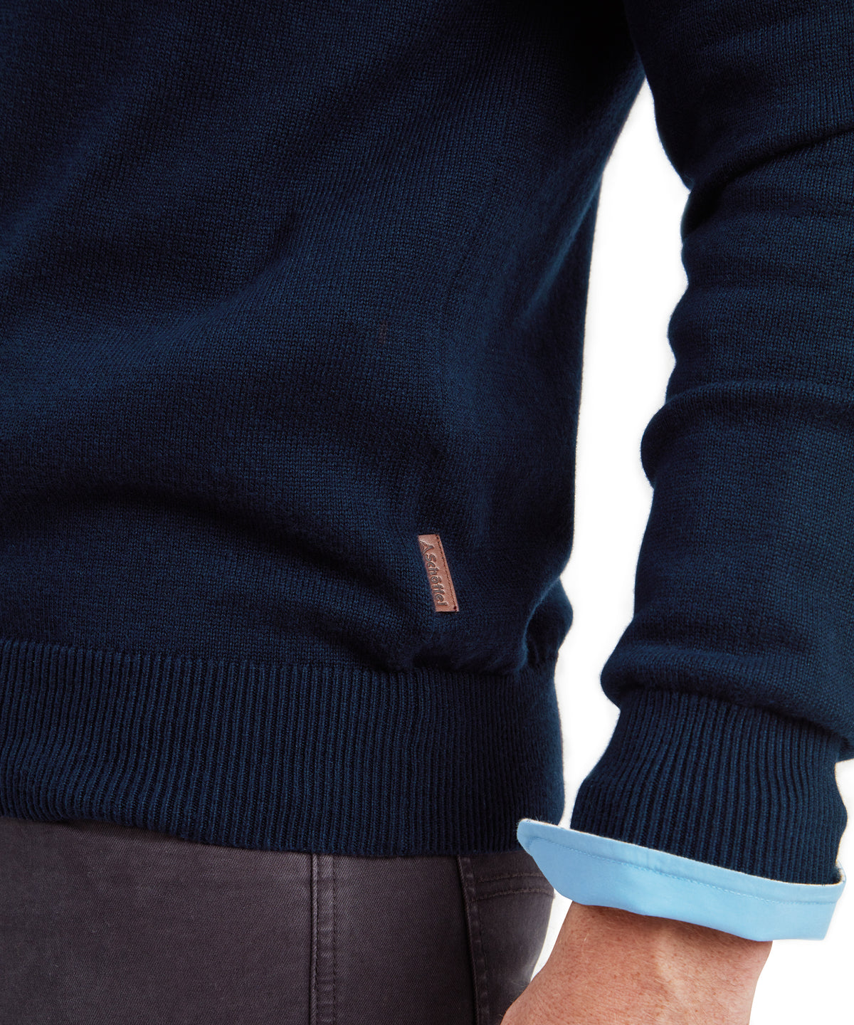 Dark navy blue cotton cashmere quarter zip jumper with ribbed cuffs and subtle light blue inner