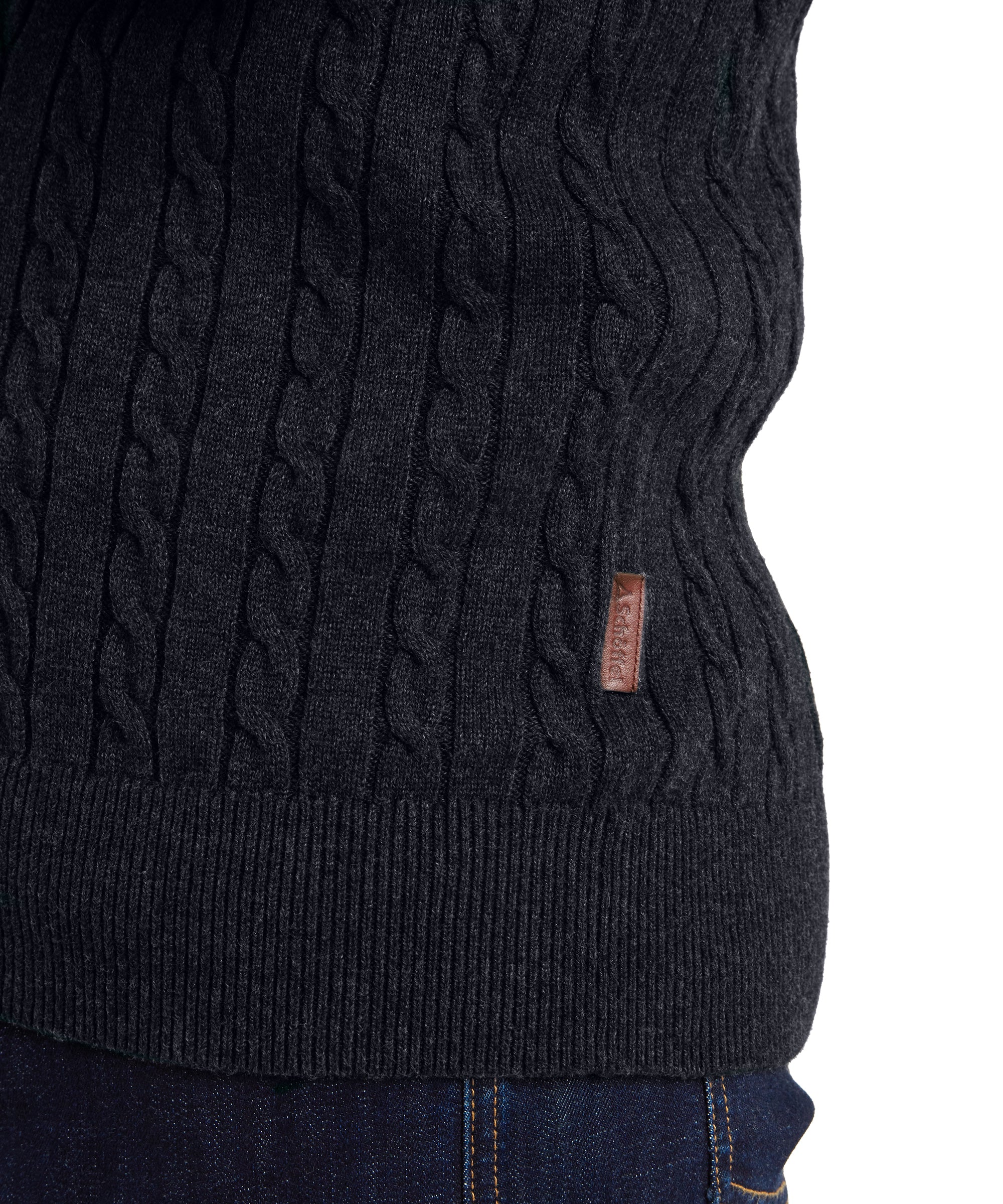 Dark gray cable knit cotton cashmere jumper with ribbed hem and brown leather brand tag in charcoal