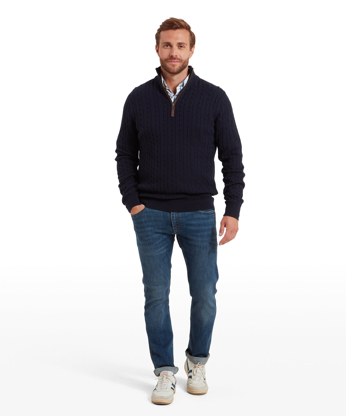 Model wearing the Schöffel Calton Cotton Cashmere Cable 1/4 Zip Jumper in Navy, quarter-zip collar