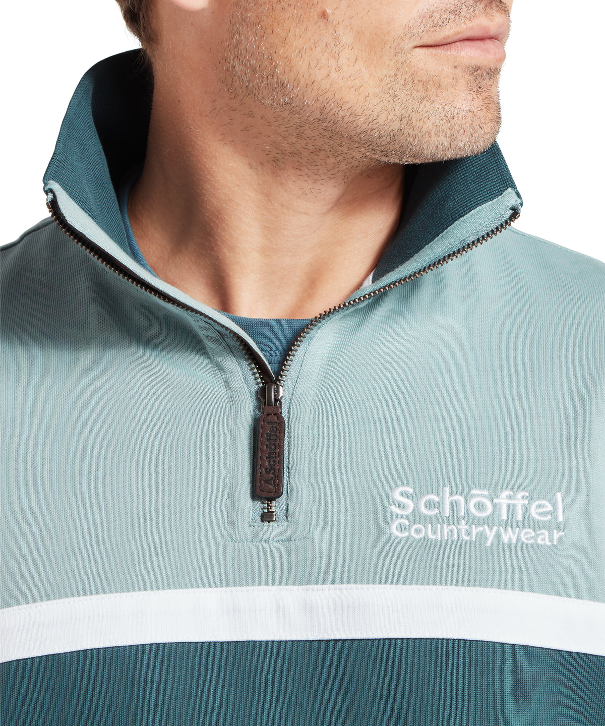 Teal and white color-blocked half-zip textured sweater with schöffel countrywear logo titled