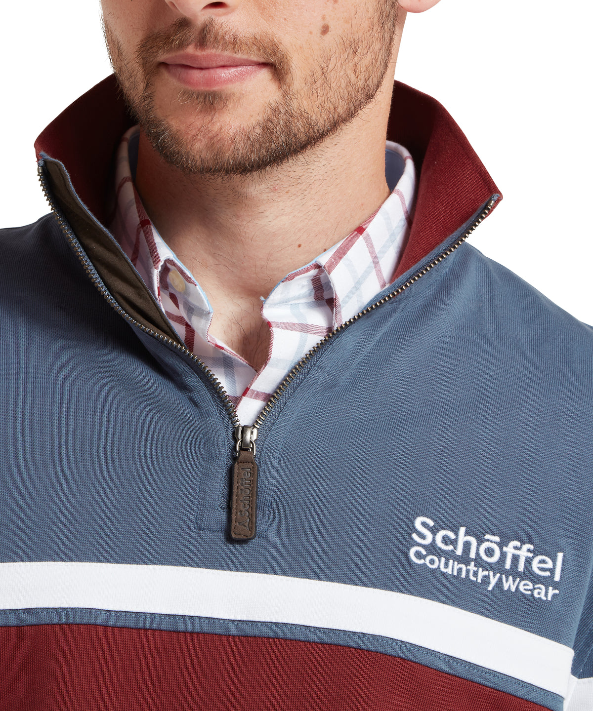 Schöffel's Exmouth Heritage 1/4 Zip in Navy, on model, maroon with white stripe