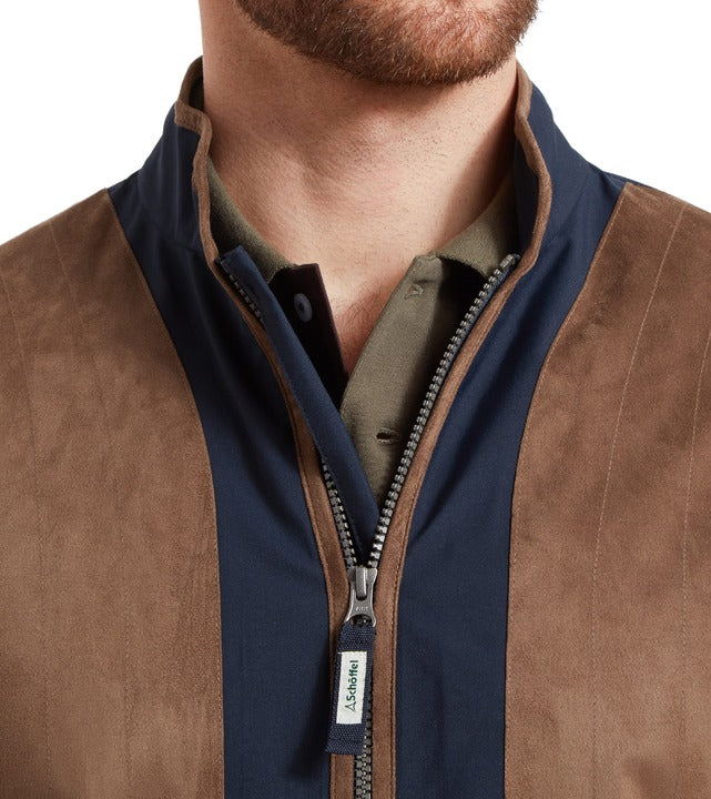 Schöffel Grimsthorpe men's clay shooting jacket in navy, close-up of contrast suede panels and collar with full-length zip and branded pull tag, worn over checked shirt