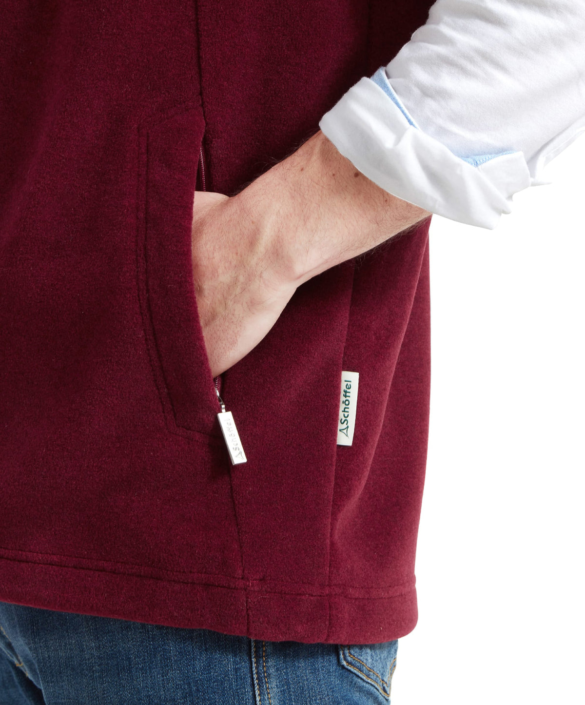 Oakham fleece gilet claret maroon fleece vest with zipper pocket and white brand tag for outdoor