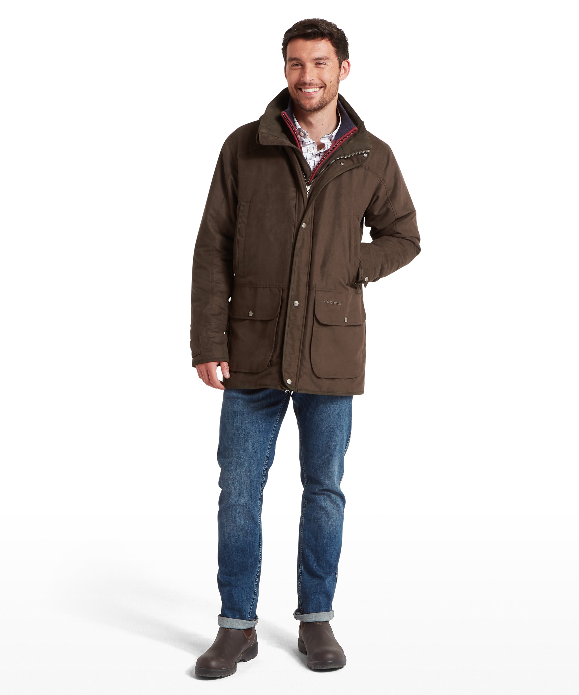 Man wearing a brown jacket and blue jeans on a white background