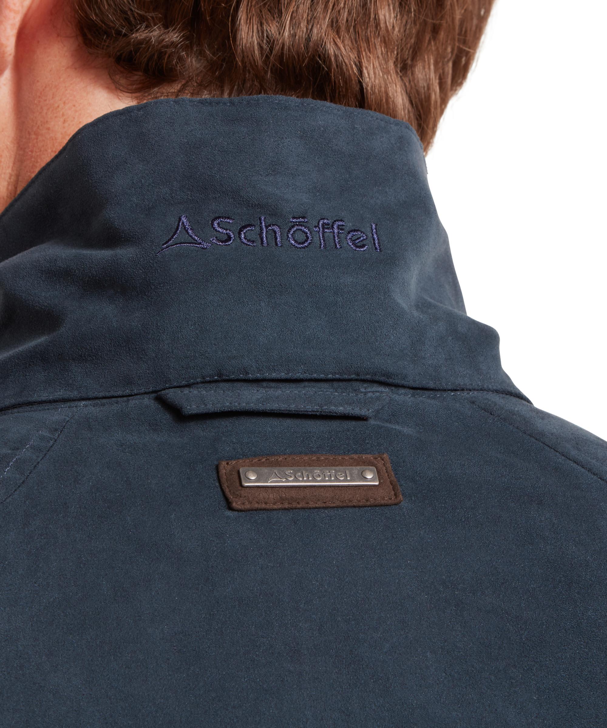 Navy blue jacket with Schöffel logo on the back