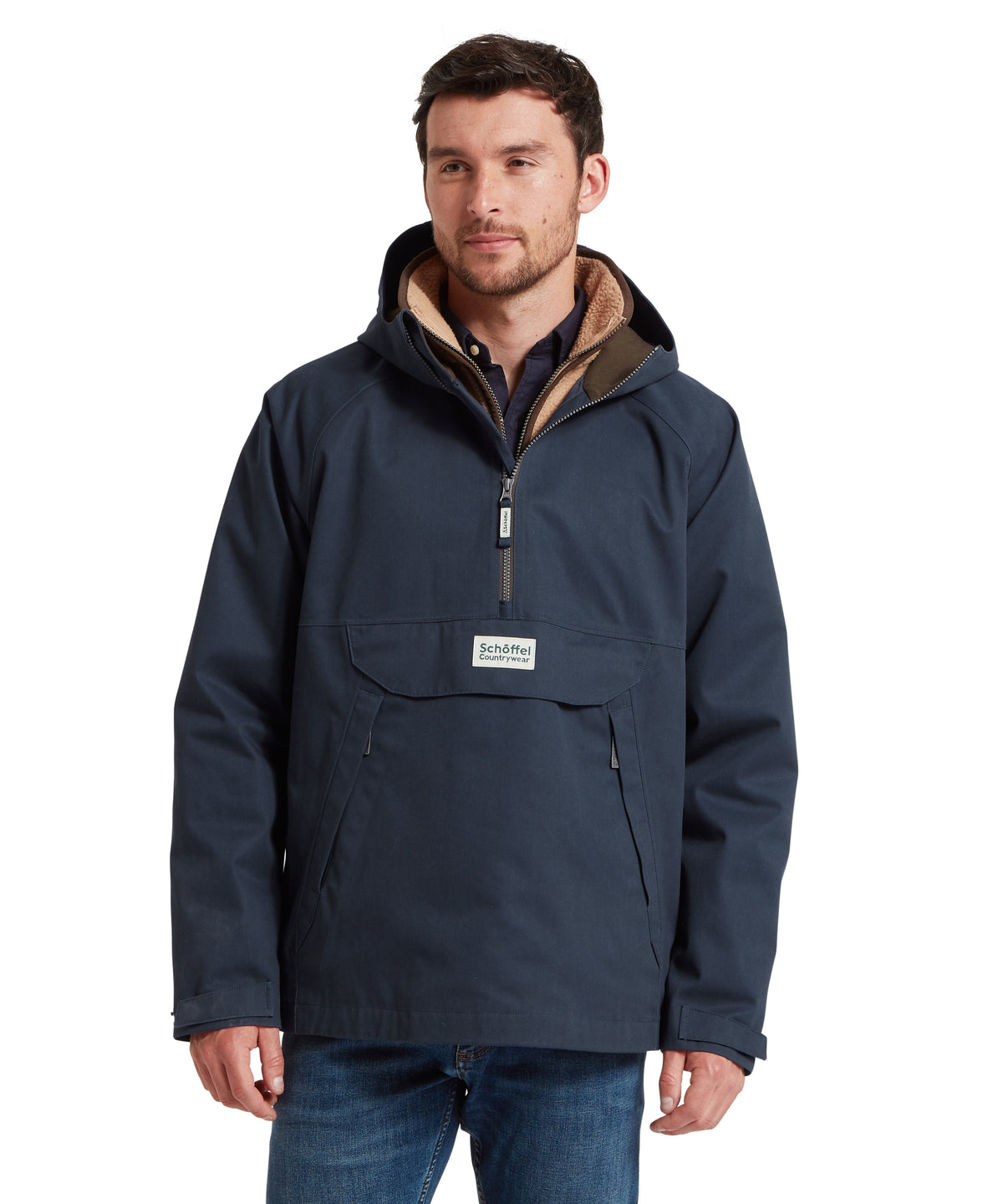 Schöffel Men's Overton Waterproof Anorak in Navy with fleece-lined hood, worn by model