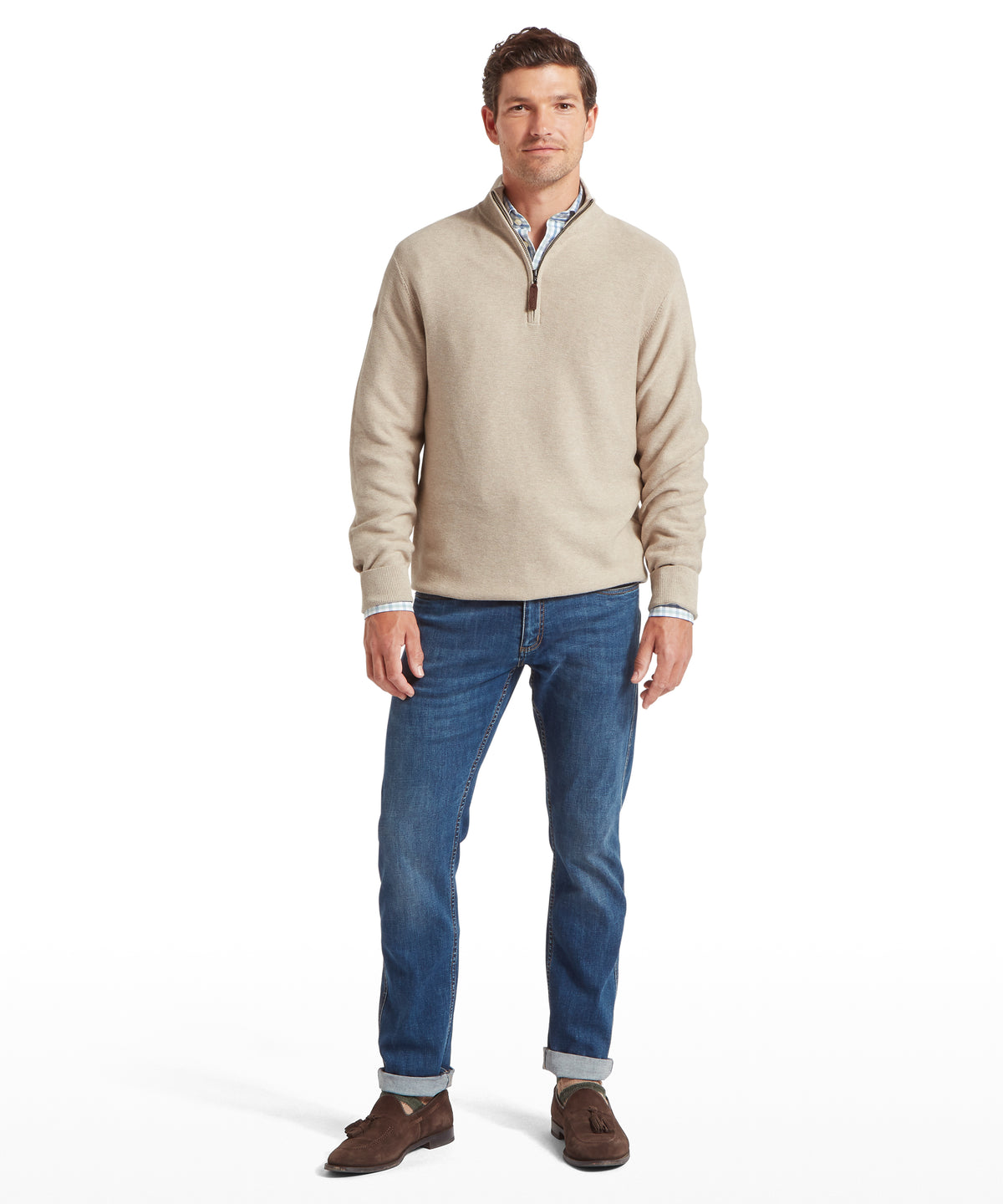 Beige porthleven quarter zip jumper with ribbed cuffs and collar worn over patterned collared shirt