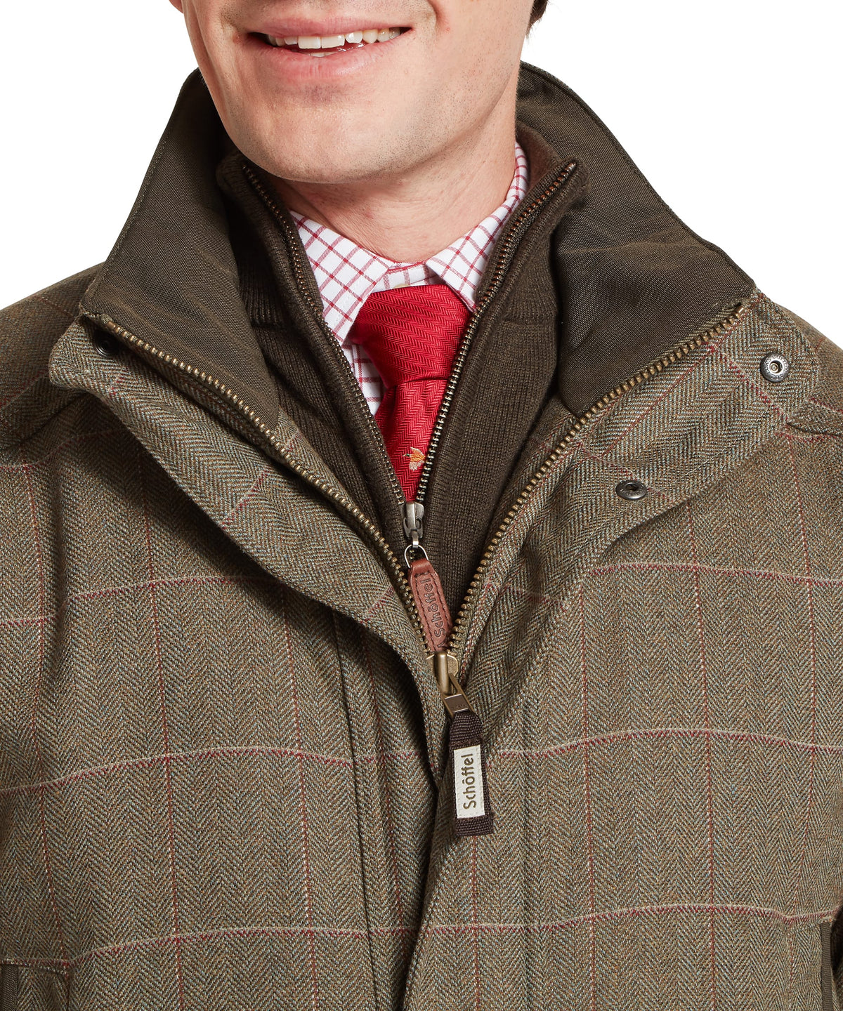 Ptarmigan tweed classic coat in olive green scottish tartan with brown and red woven tweed texture