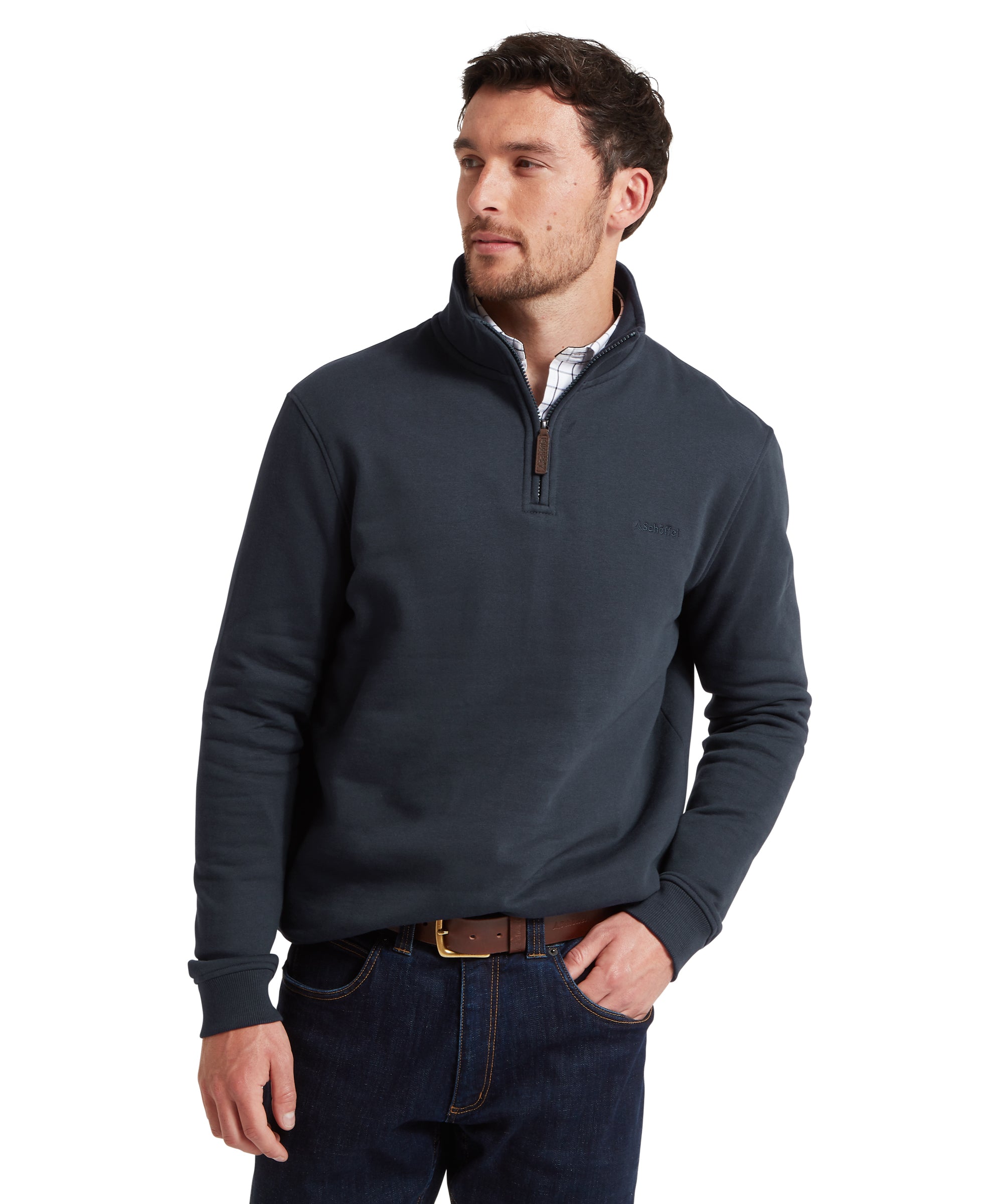 Man wearing a dark gray quarter-zip sweater on a white background