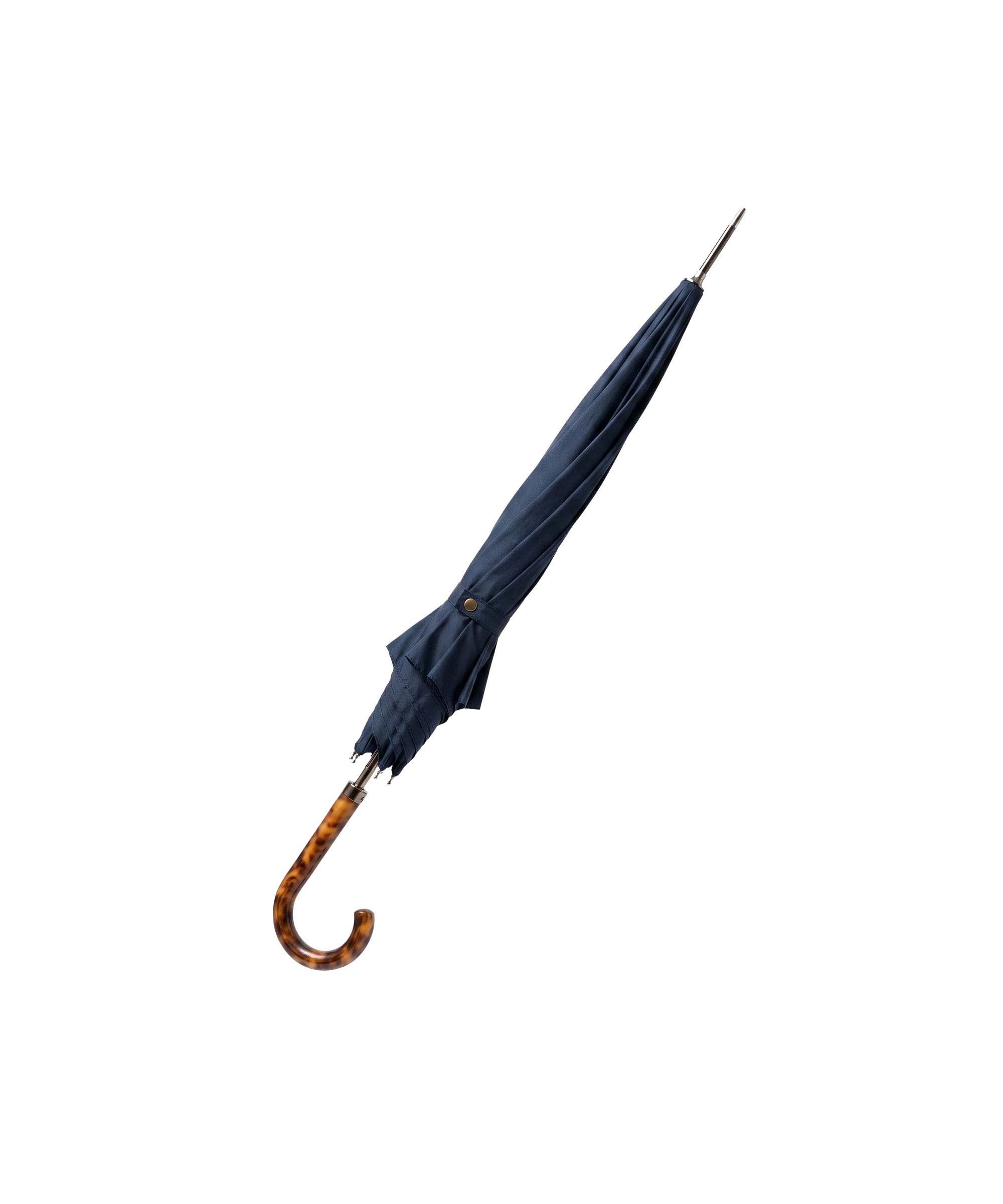 Navy blue uppingham umbrella with a tortoiseshell-patterned curved handle for stylish rain