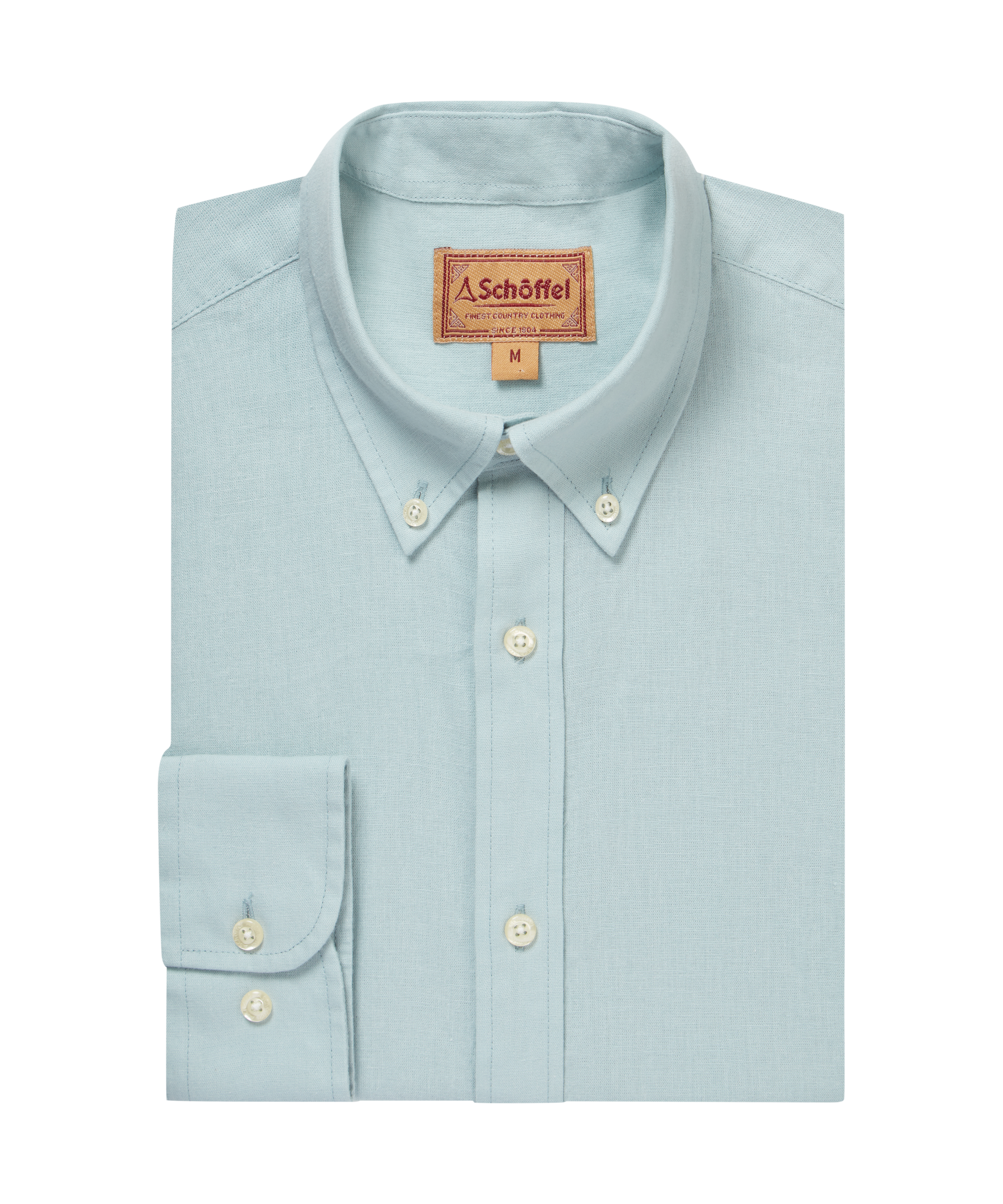 Light blue shirt with buttons folded on a white background