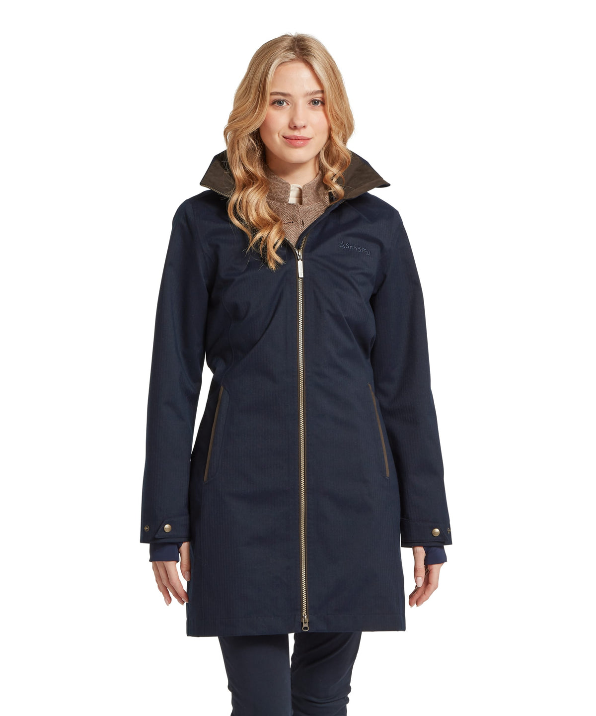 Schöffel's Allexton Wp Coat in Navy, on model, gold zipper accents for rainy weather use