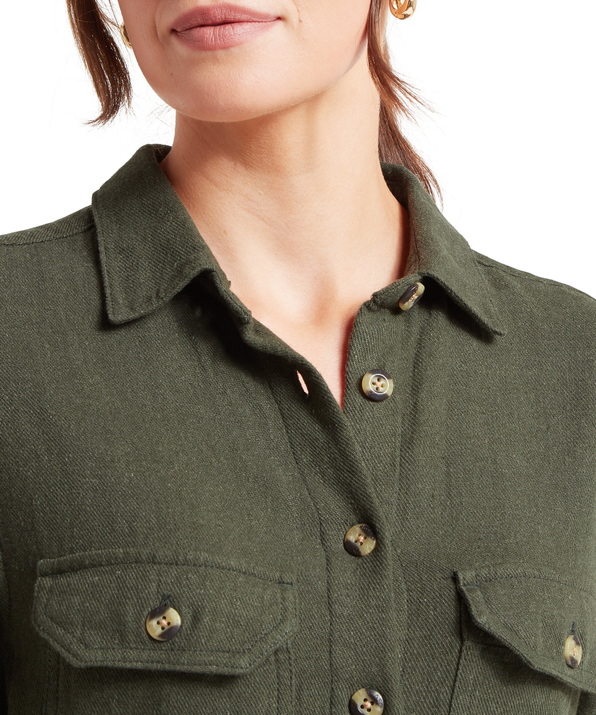 Olive green linen button-up shirt with two front pockets and tortoiseshell buttons in beetle green