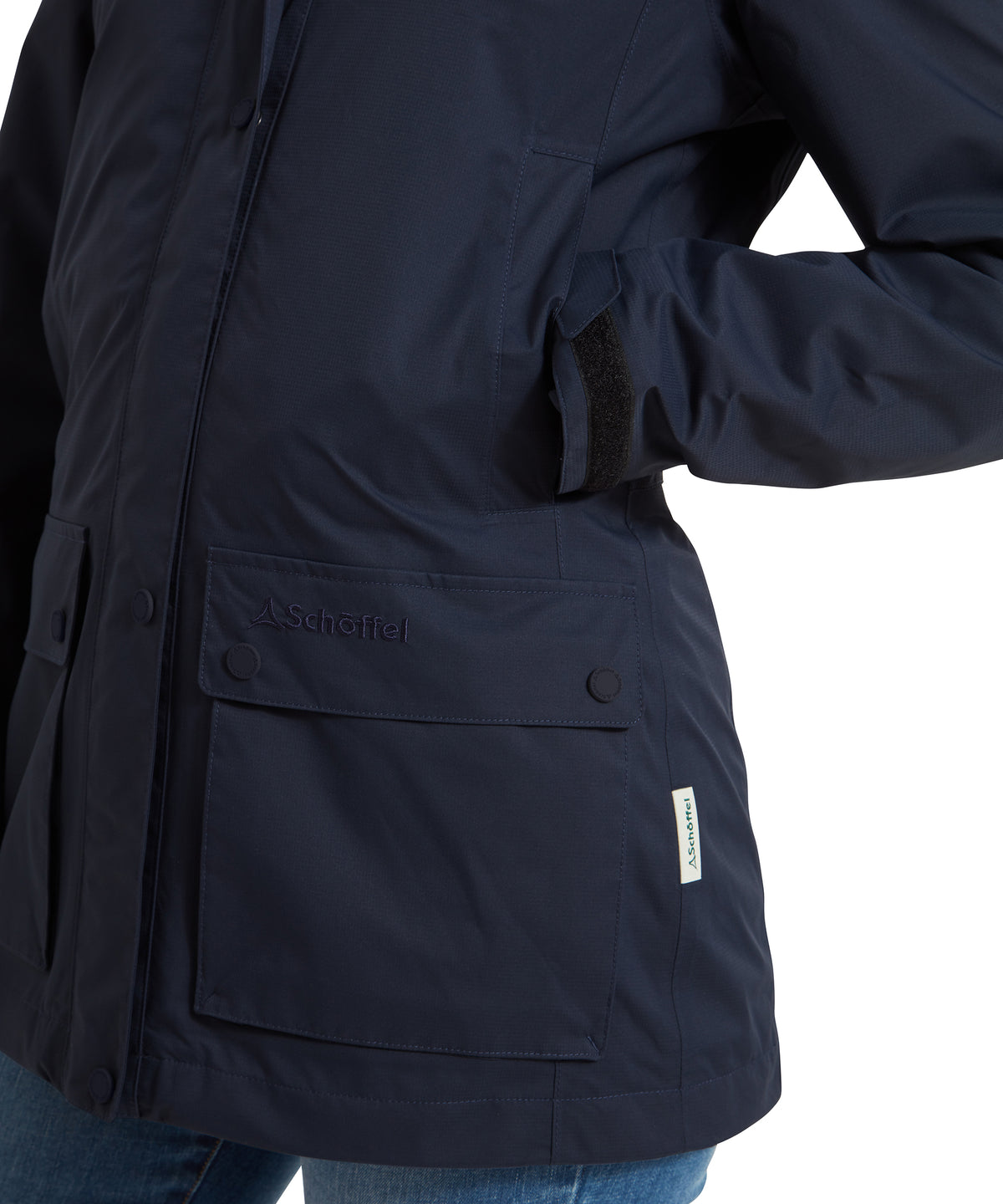 Pocket detail on the Schöffel Edith Jacket for women in Blue, embroidered logo