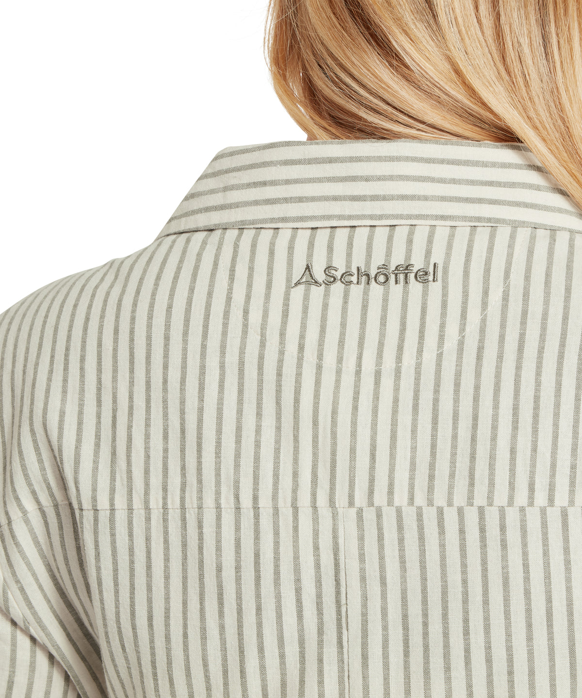 Schöffel's Fleur Linen Dress in Green, on model, schöffel logo on back collar