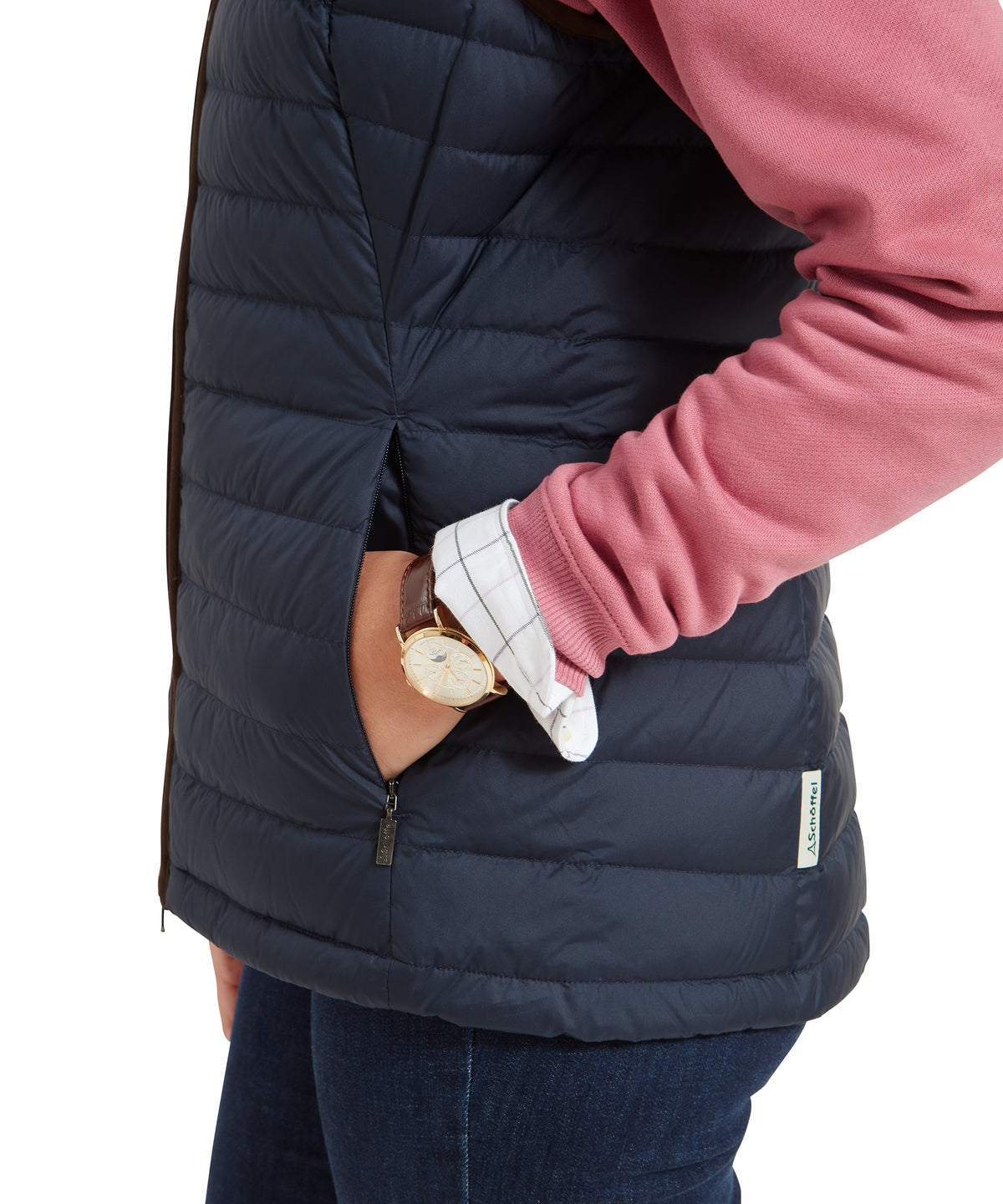 Navy blue quilted Launde Down Gilet with zipper pocket and brand tag on the side in petrol blue