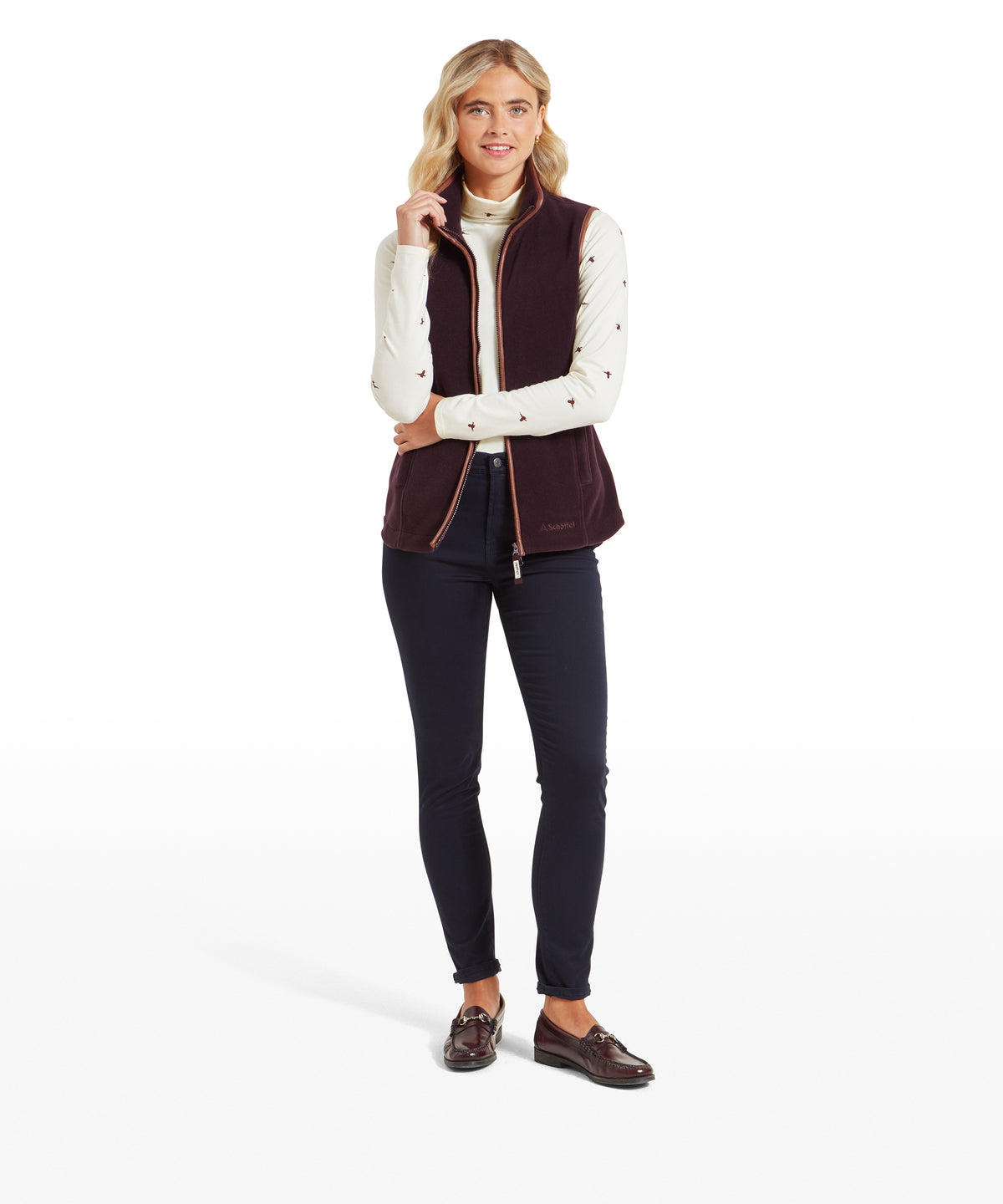 Maroon fleece vest with copper zippers and subtle embroidered details in the lyndon fleece gilet