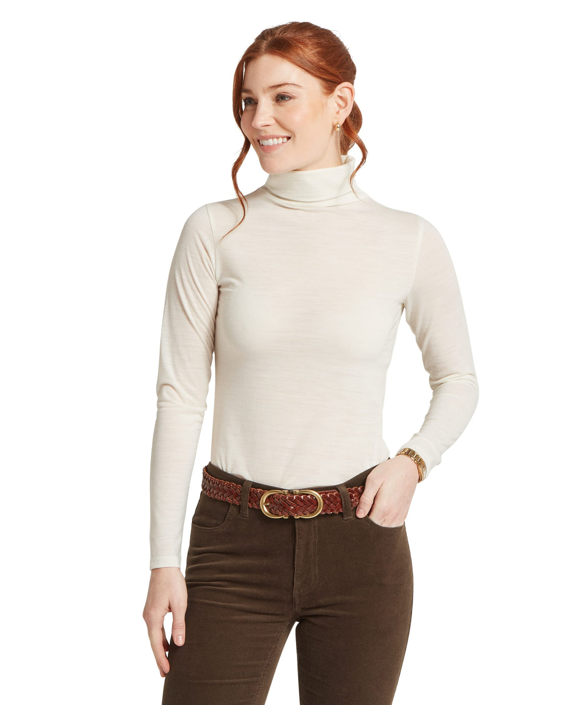 Cream-colored long-sleeved malton merino top with a smooth form-fitting knit fabric in soft white