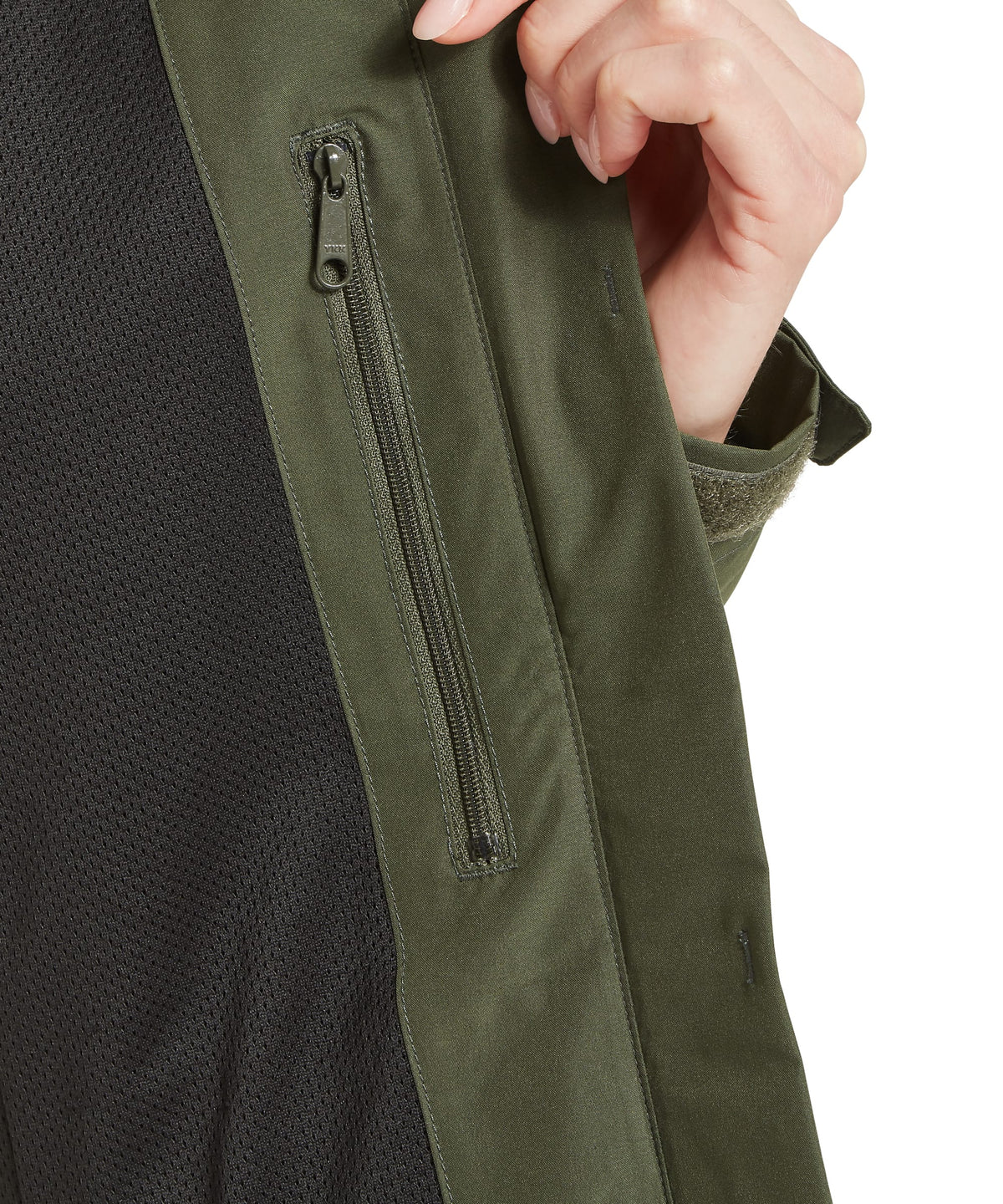Schöffel's Manton Lightweight Jacket in Green, on model, zipper pocket in woodland color