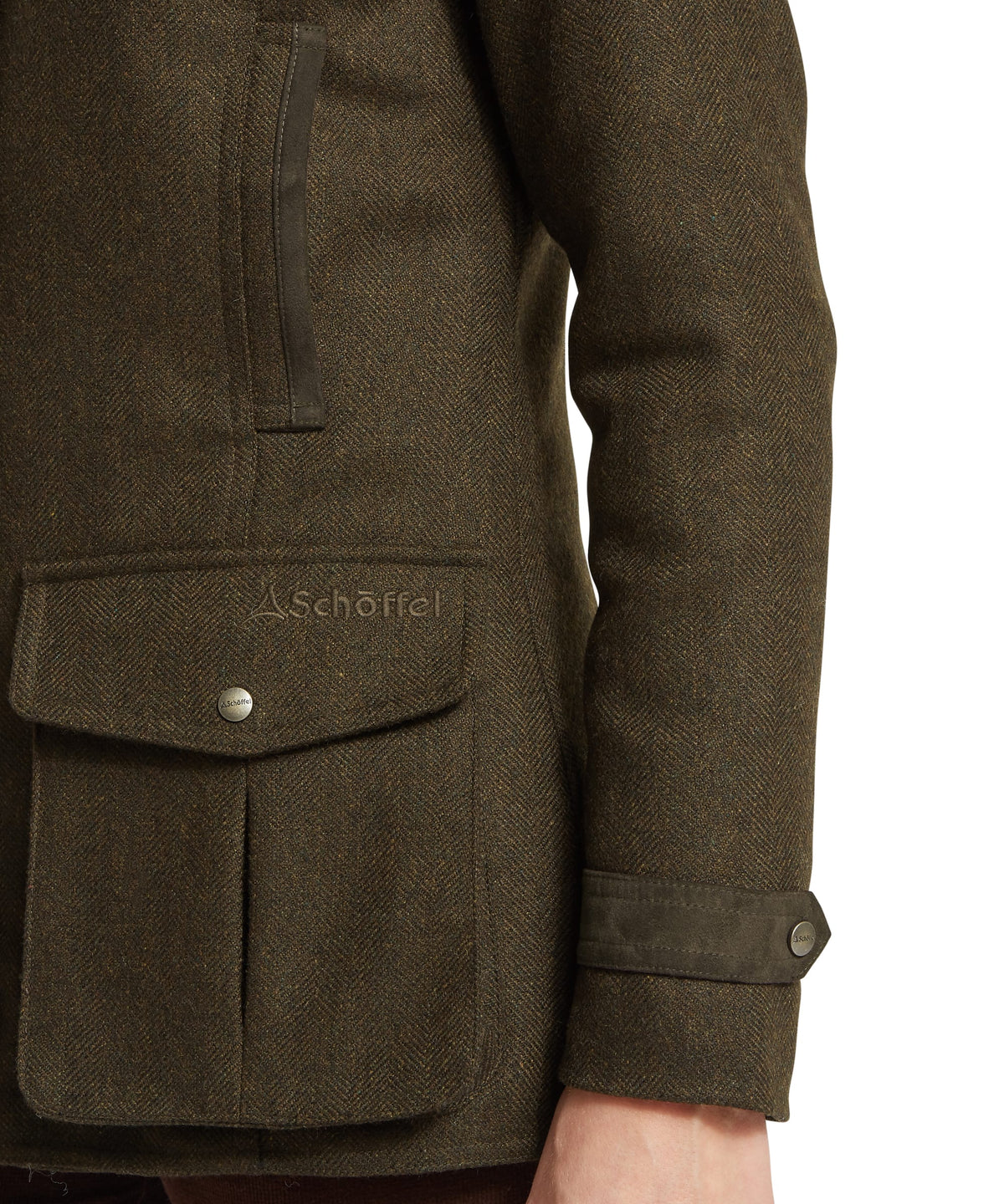 Olive green murra tweed coat in dark loden herringbone wool with subtle schoffel logo on chest