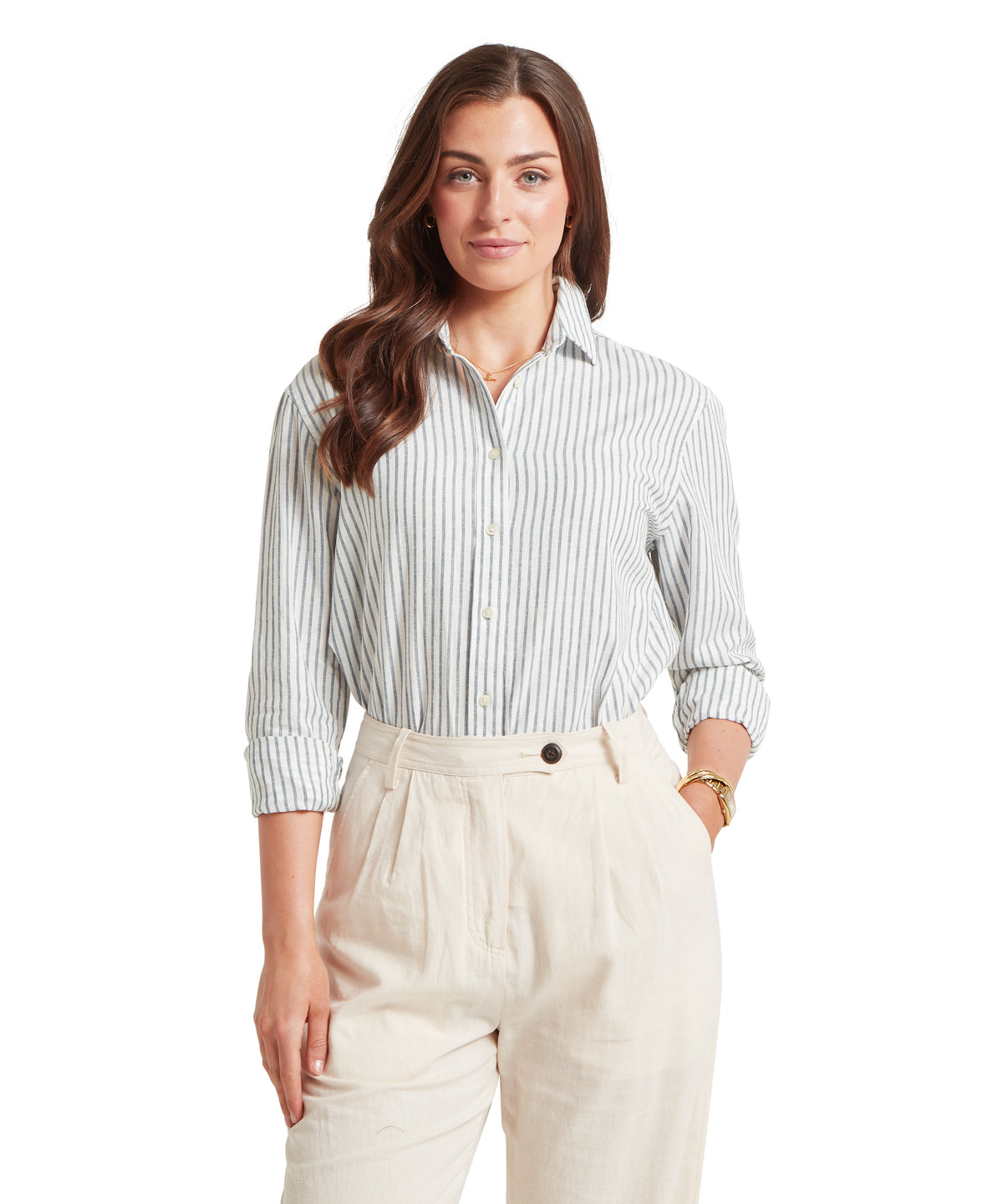 Woman wearing salthouse linen shirt blue stripe with light blue and white vertical stripes