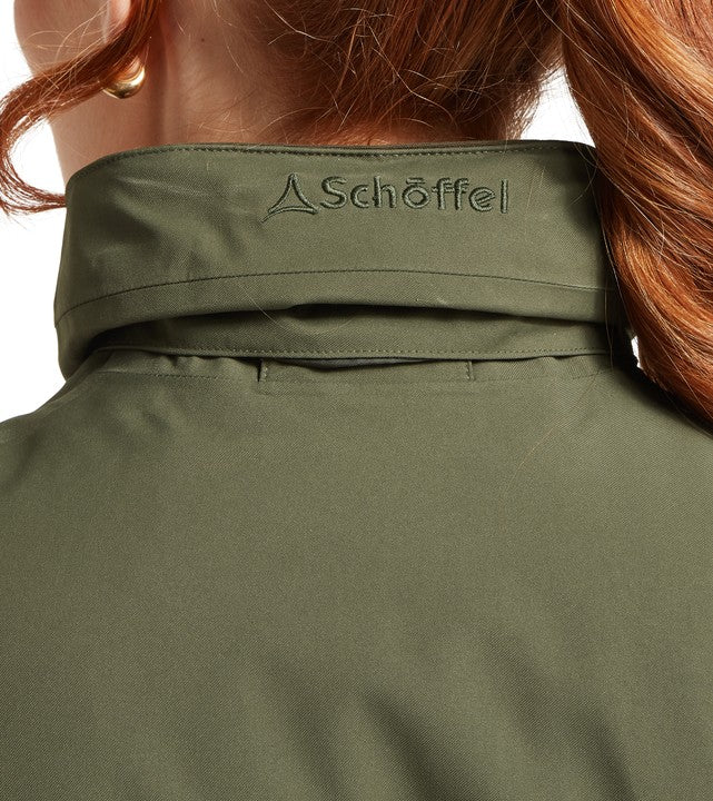 Rear neck detail of the Schöffel Women's Teal Ultralight Coat in olive green