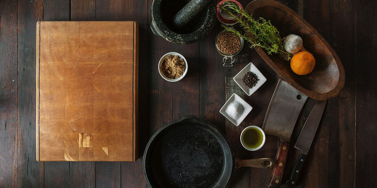 Rustic wooden cutting board with natural grain for pheasant rillettes