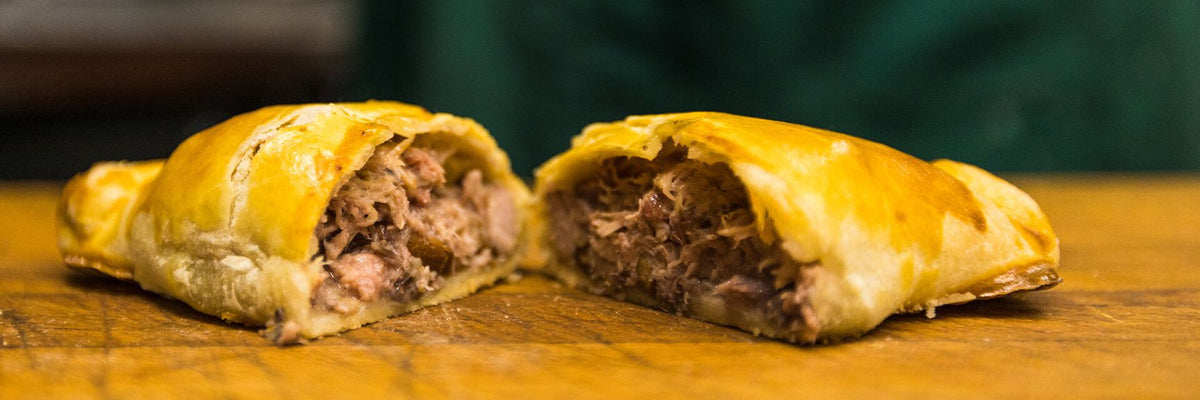 Golden-brown flaky squirrel and girolle pasty with savory meat filling