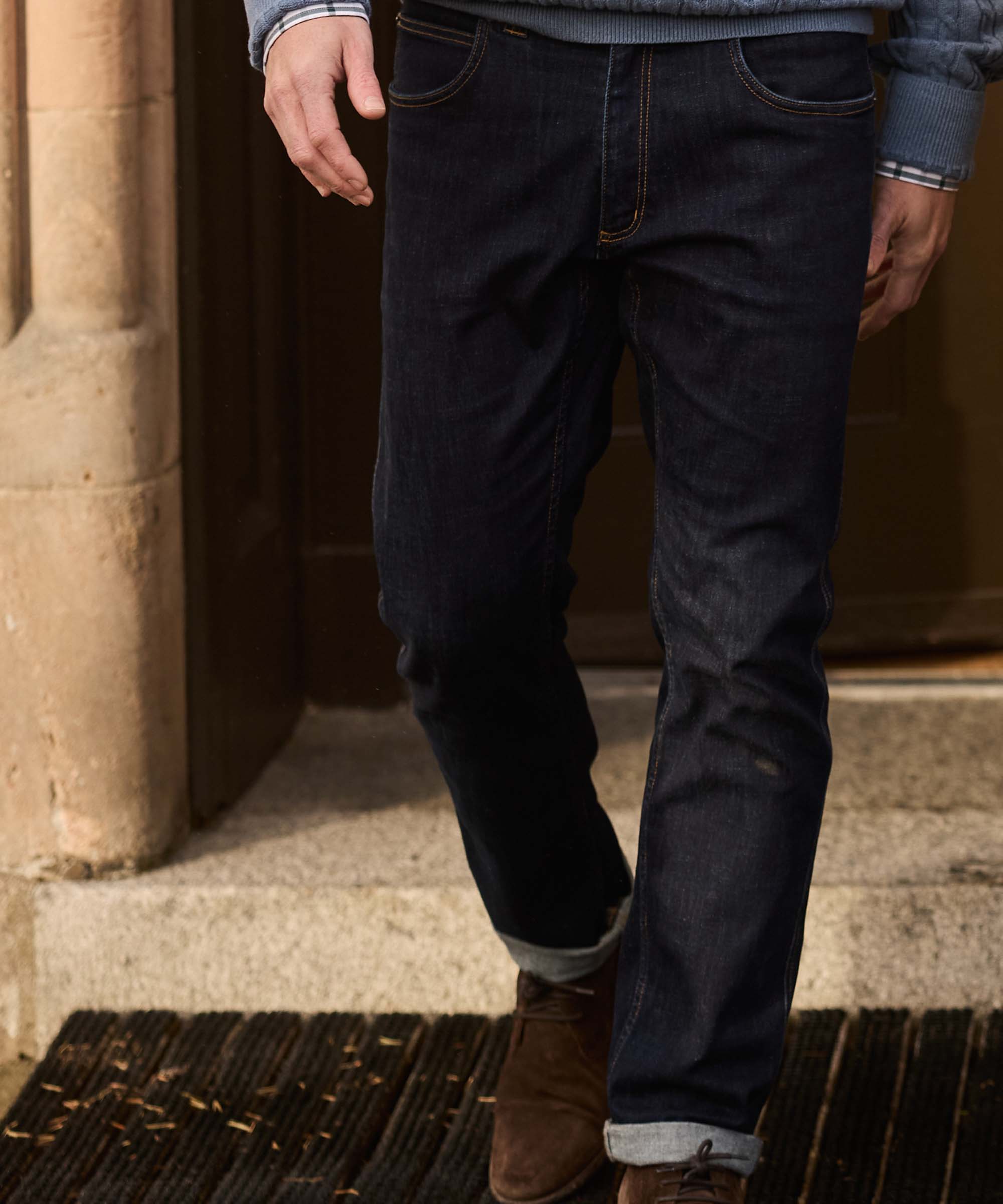 Dark indigo denim chiltern jeans with a classic straight-leg cut and rolled cuffs in dark denim