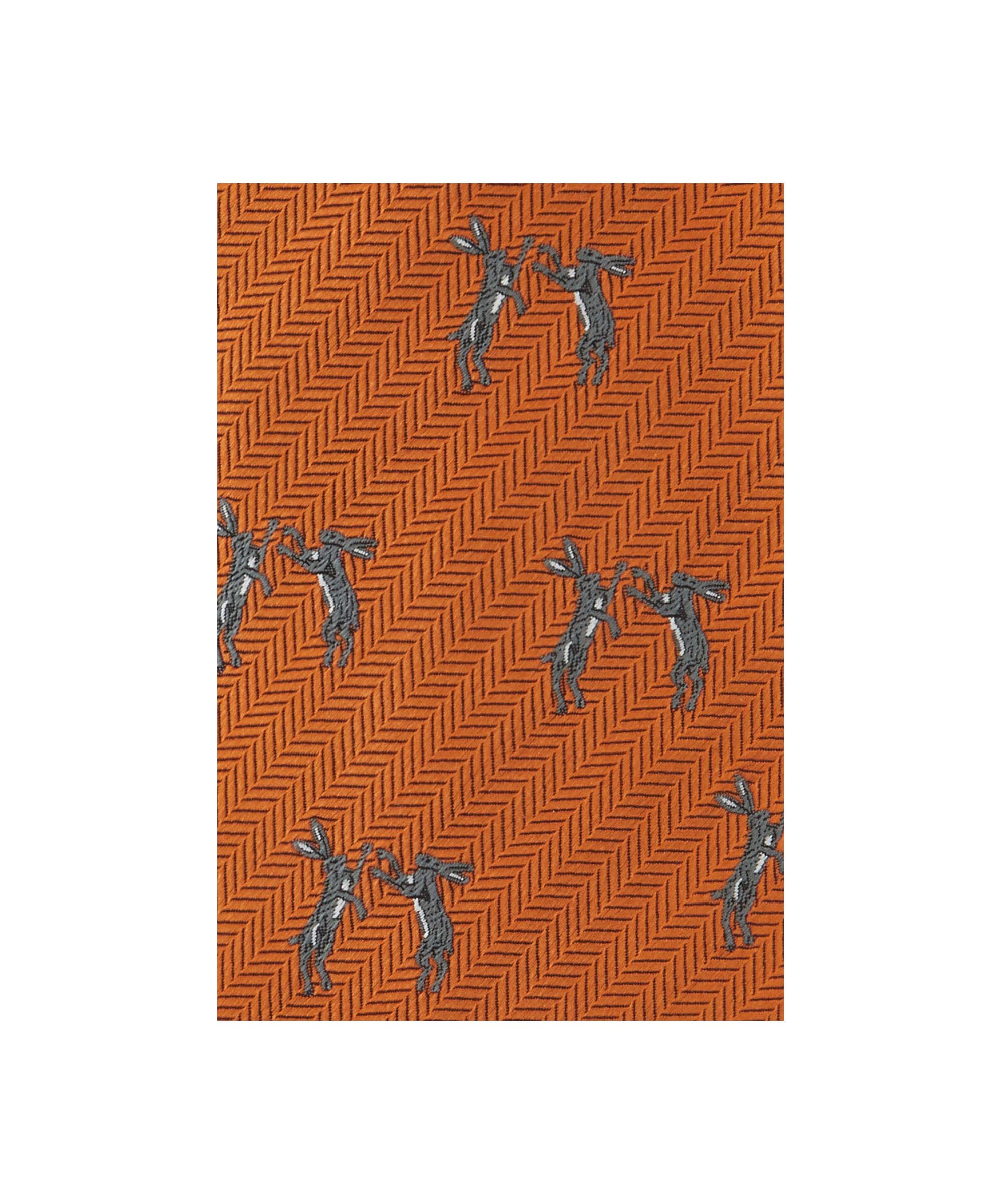 Schöffel Men's Silk Tie in Orange with embroidered boxing hare pattern on herringbone ground close-up detail.