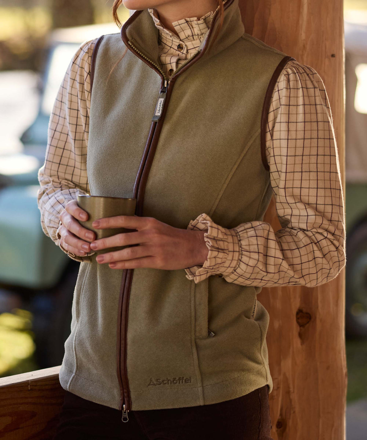 Lyndon fleece gilet sage green olive green fleece vest with brown zipper and trim and subtle brand