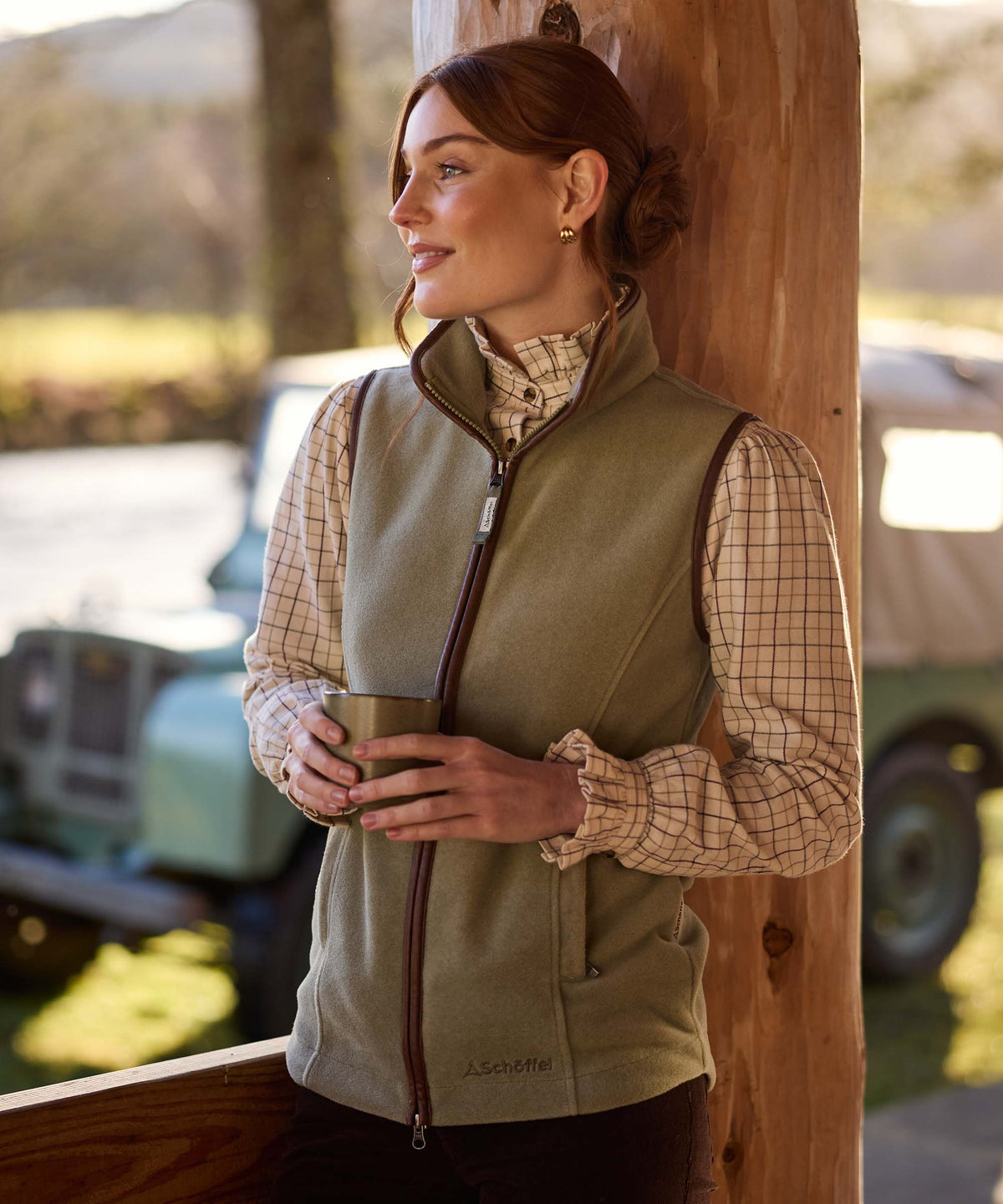 Lyndon fleece gilet sage green olive green fleece vest with brown leather trim and zipper details