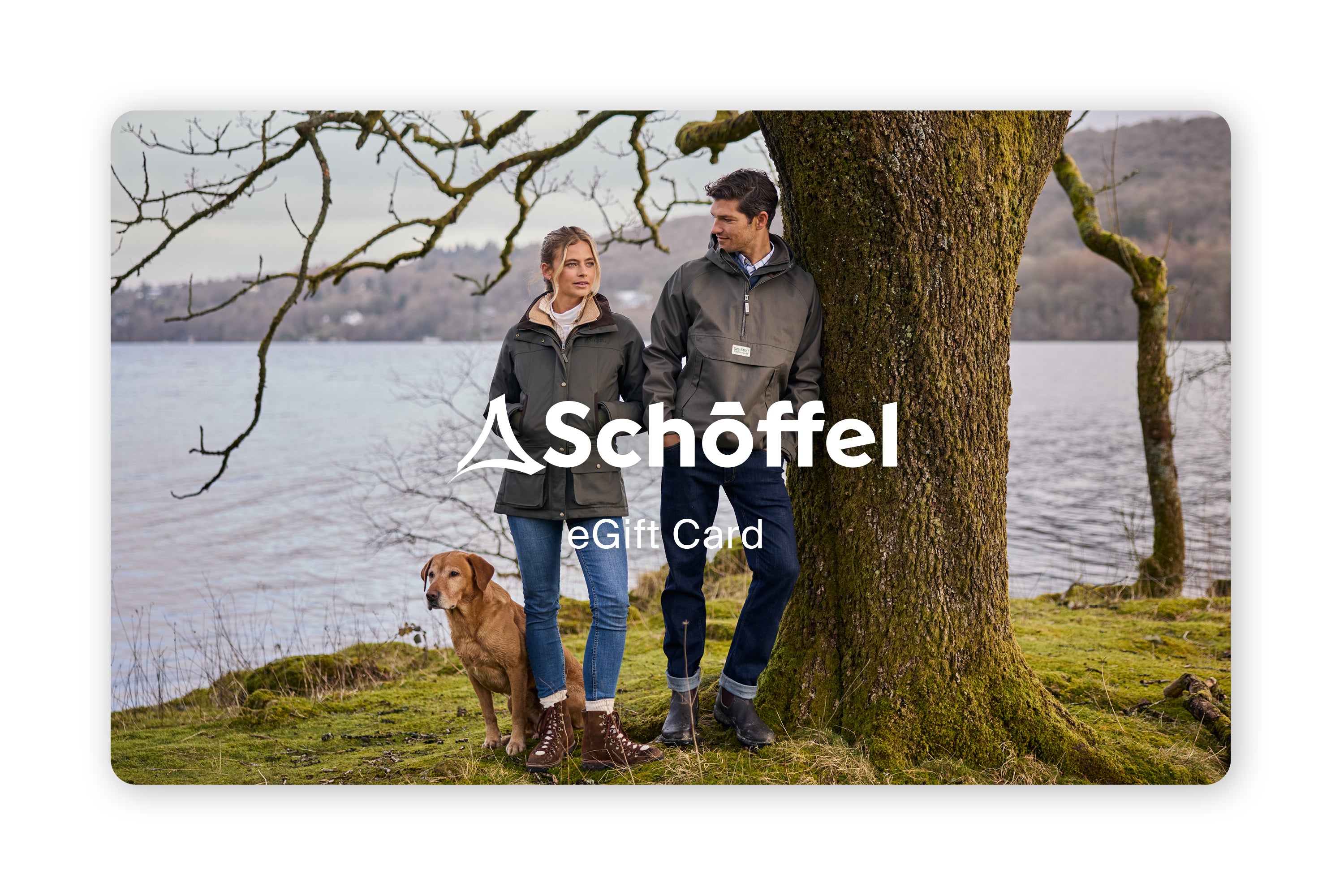 Schöffel gift card with a couple and dog by a tree by a lake
