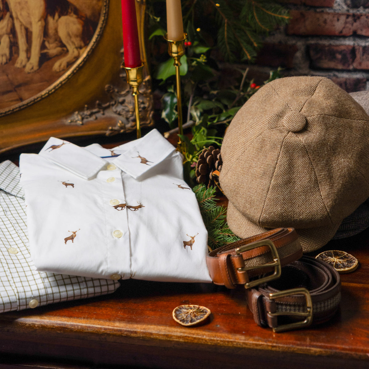 Stag print shirt, tweed cap and leather belts for festive gifting
