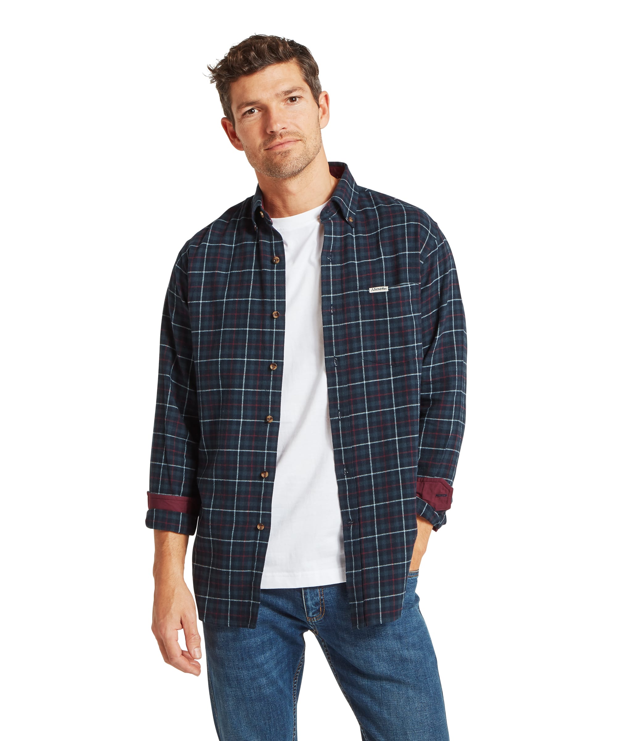 Schöffel Men's Akenham Shirt in Blue - front view of a navy and burgundy windowpane tartan flannel shirt worn open over a white T-shirt with jeans, featuring a button-down collar and Schöffel chest badge.