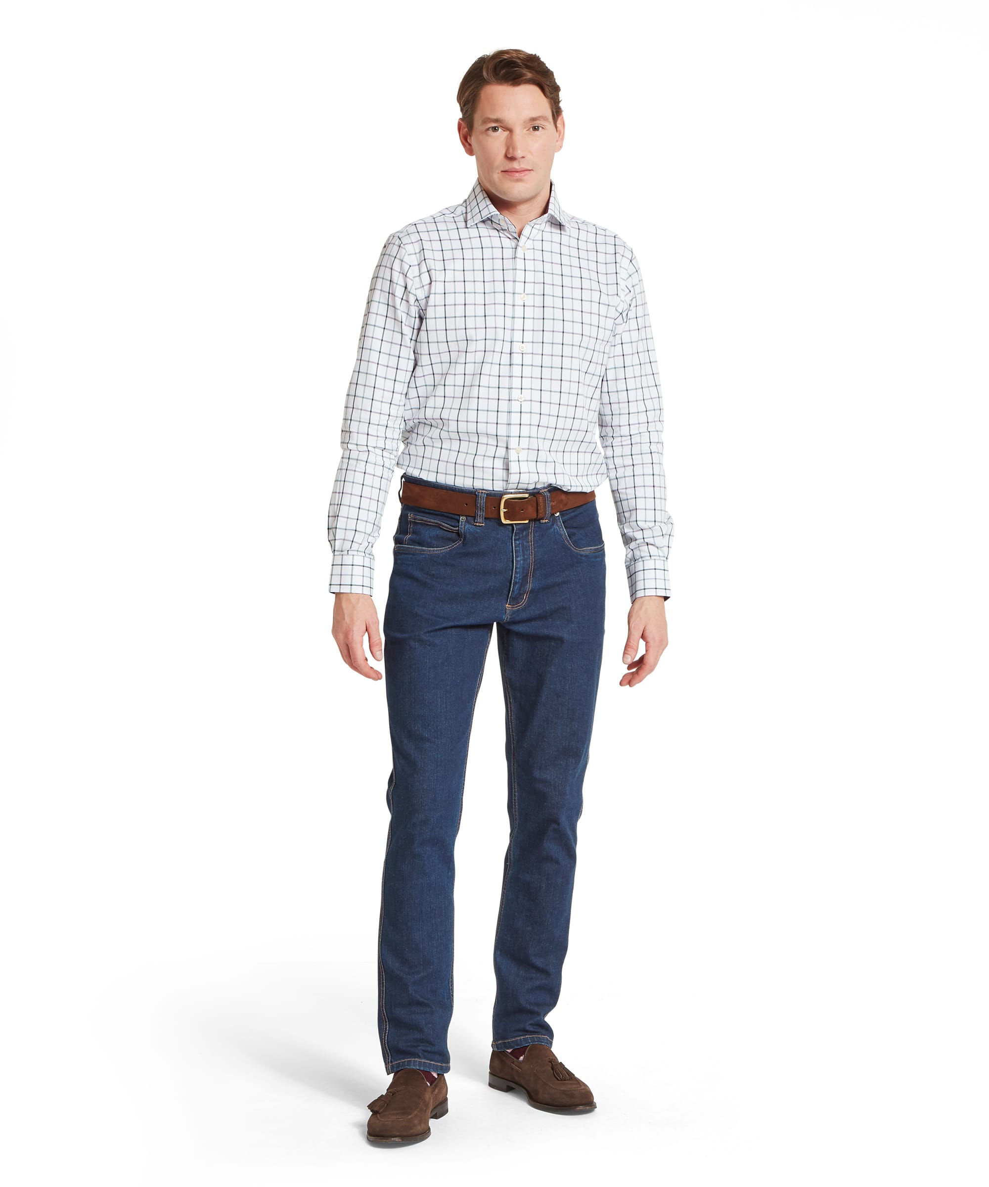 Schöffel Men's Baconsthorpe Tailored Shirt in Purple - rear view showing the clean, tailored cut of the white windowpane check shirt with centre box pleat, worn with dark indigo jeans and a tan leather belt.